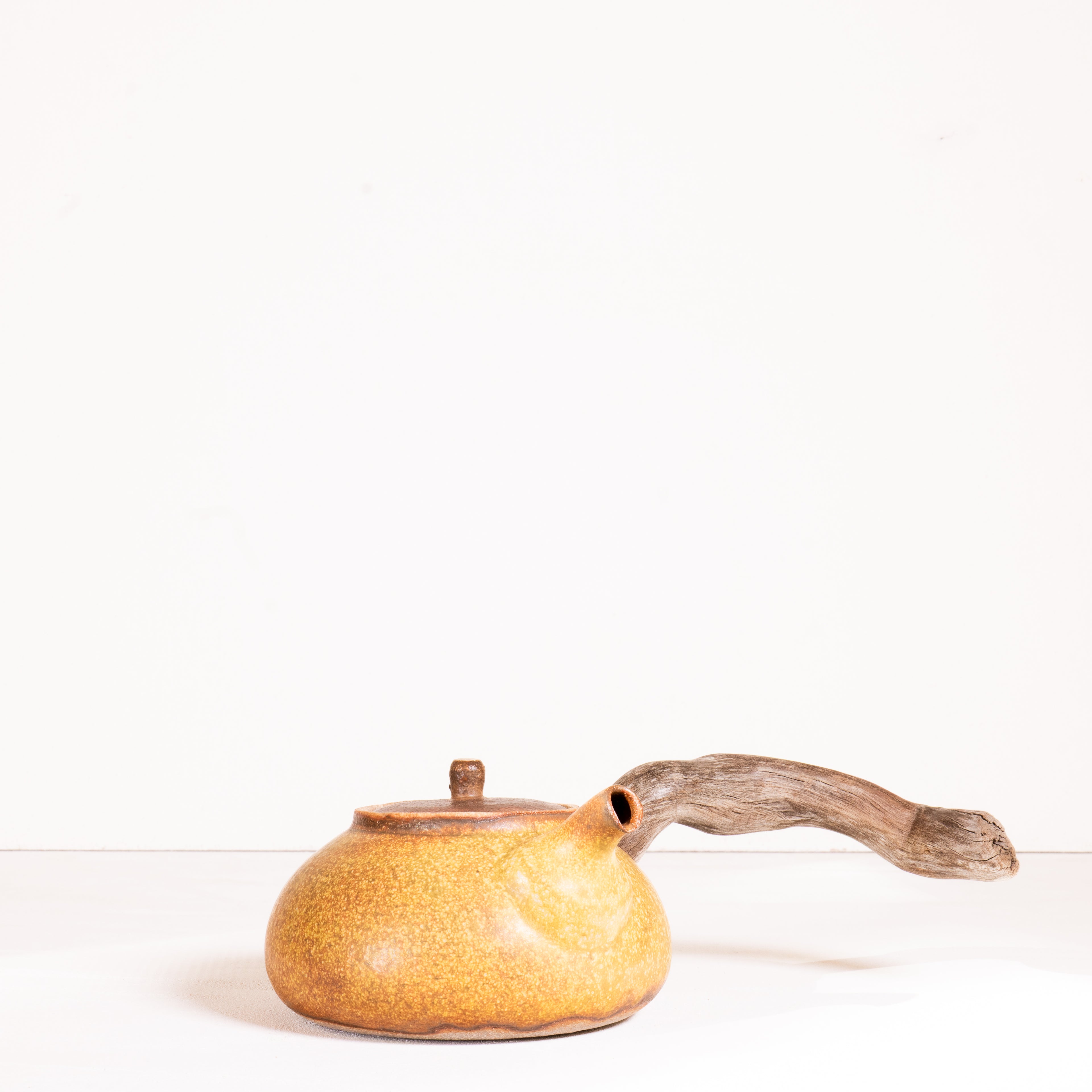 Wooden side handle teapot