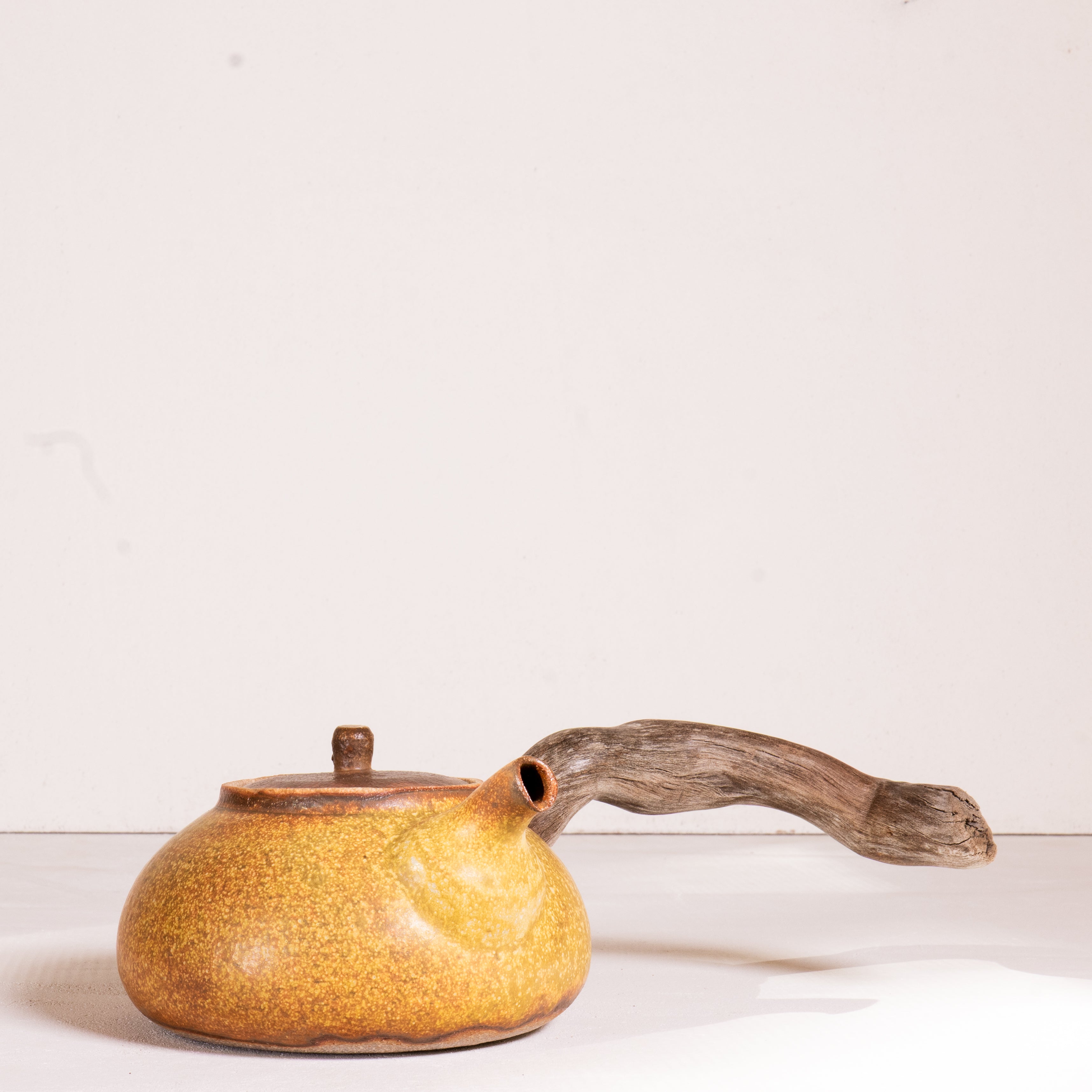 Wooden side handle teapot