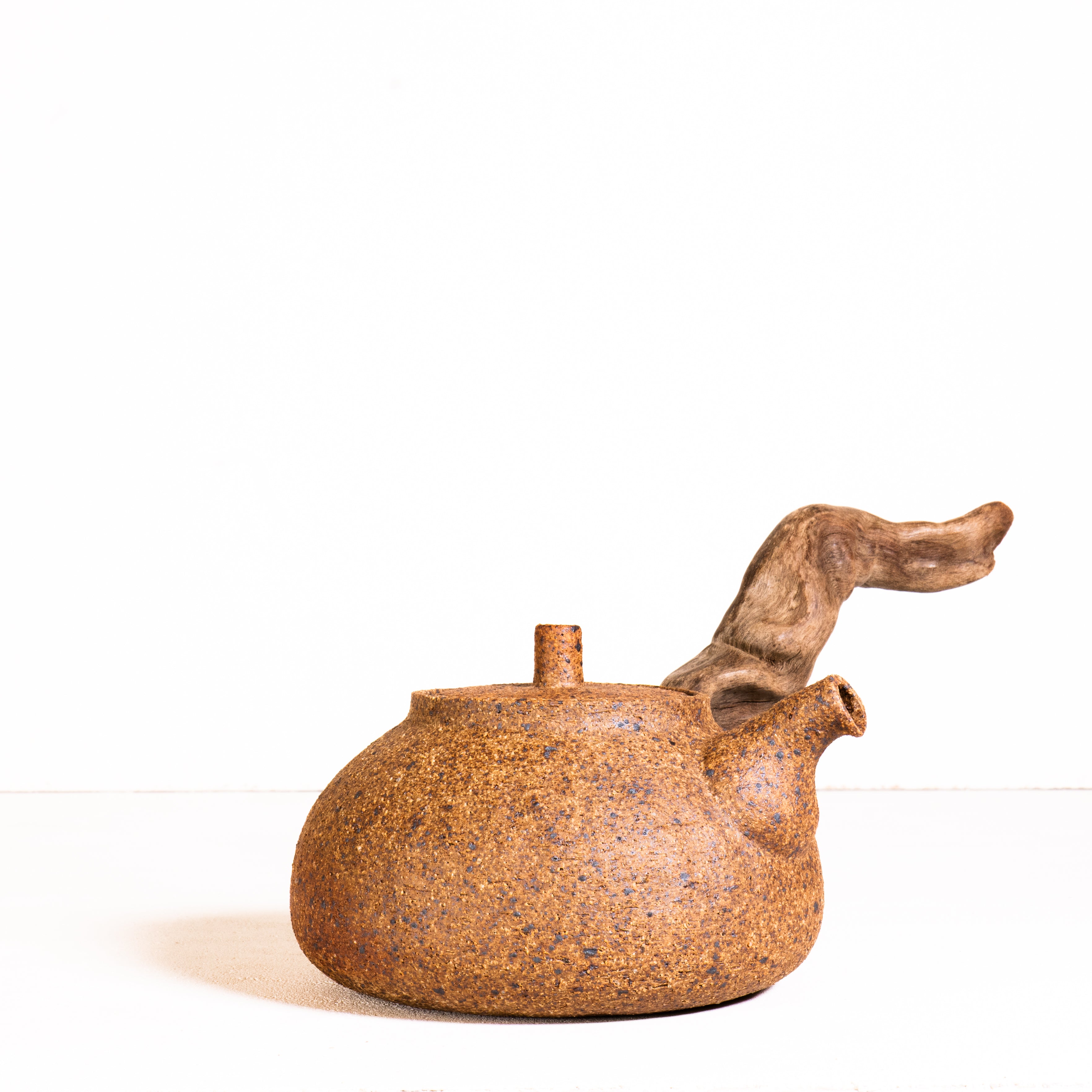 Wooden side handle teapot