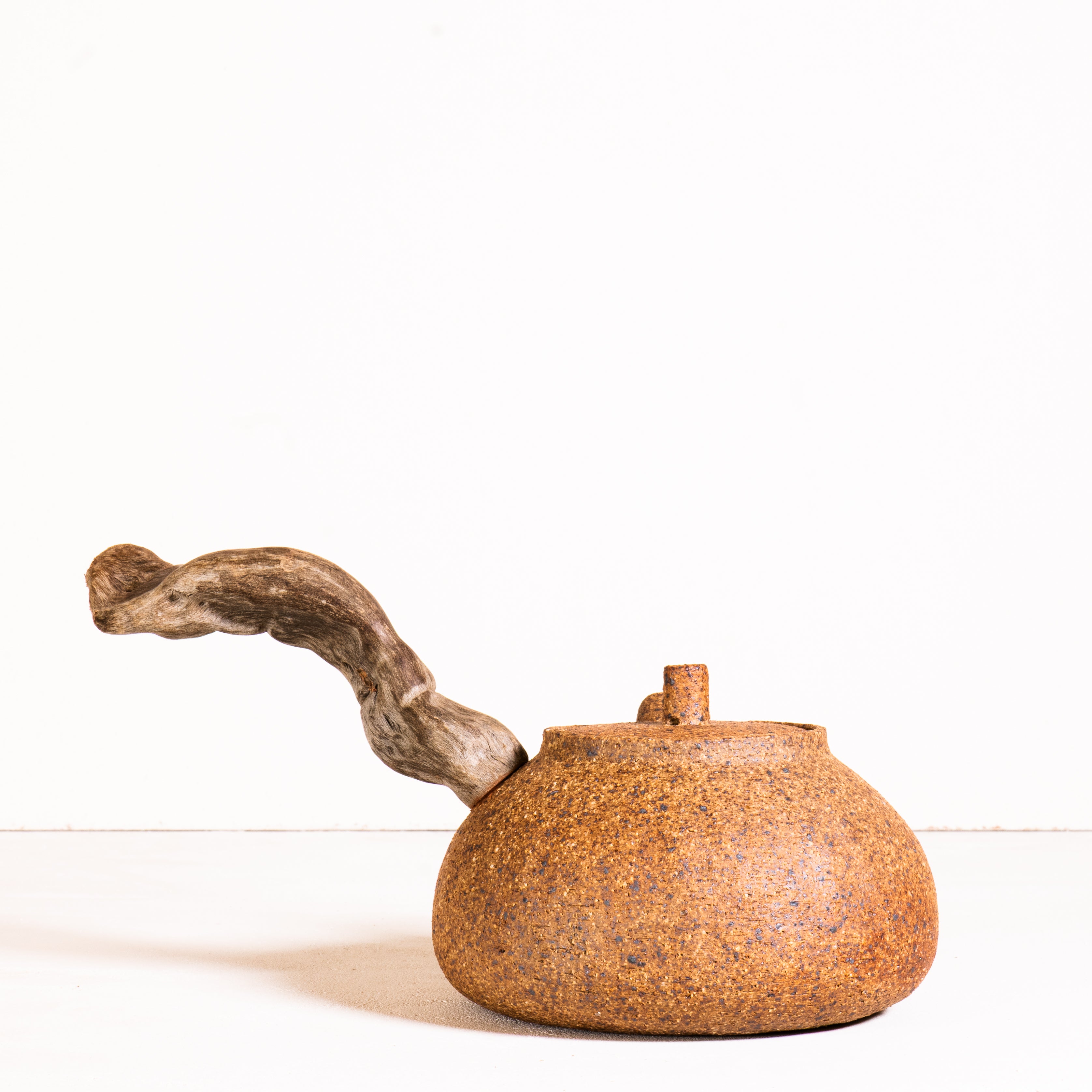 Wooden side handle teapot