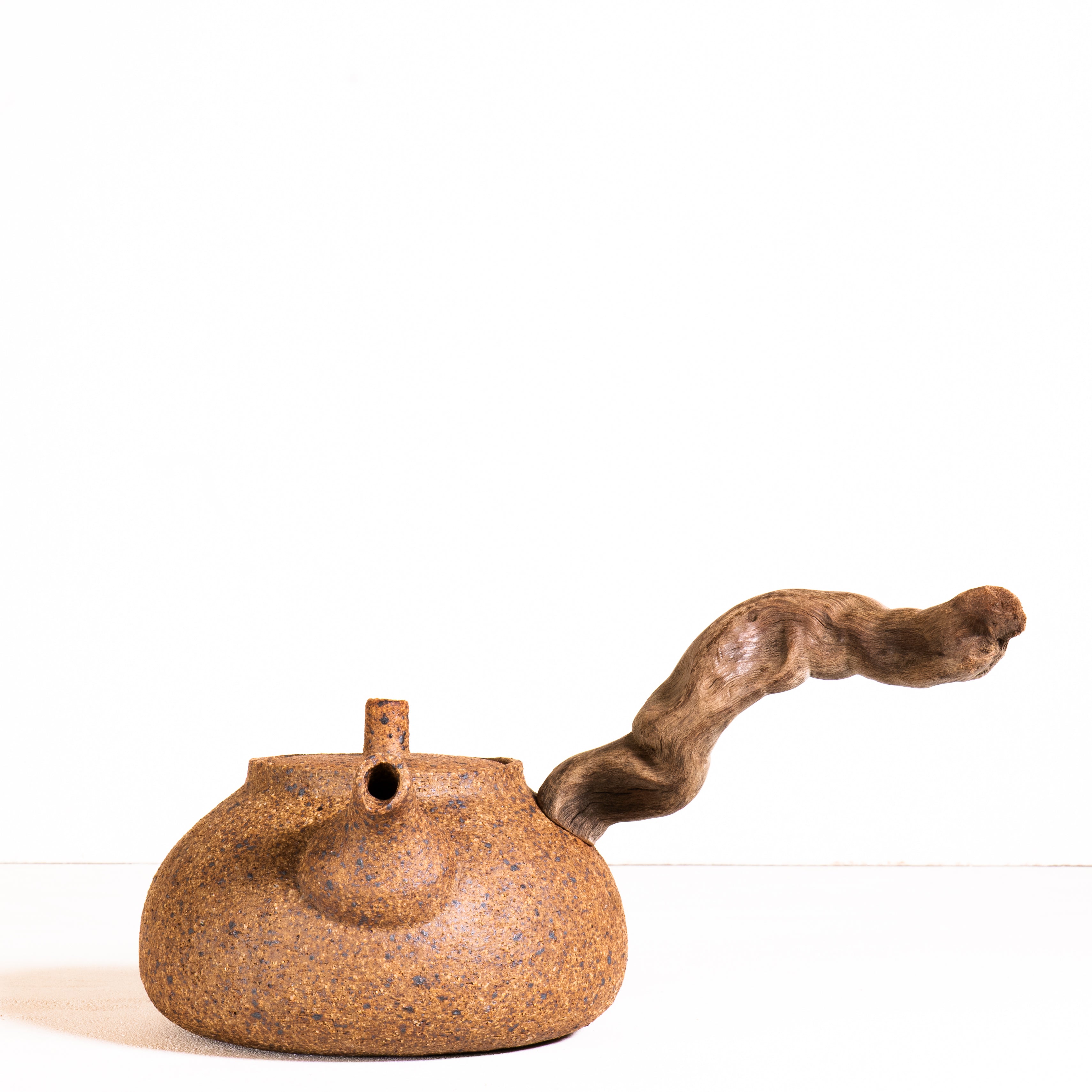 Wooden side handle teapot