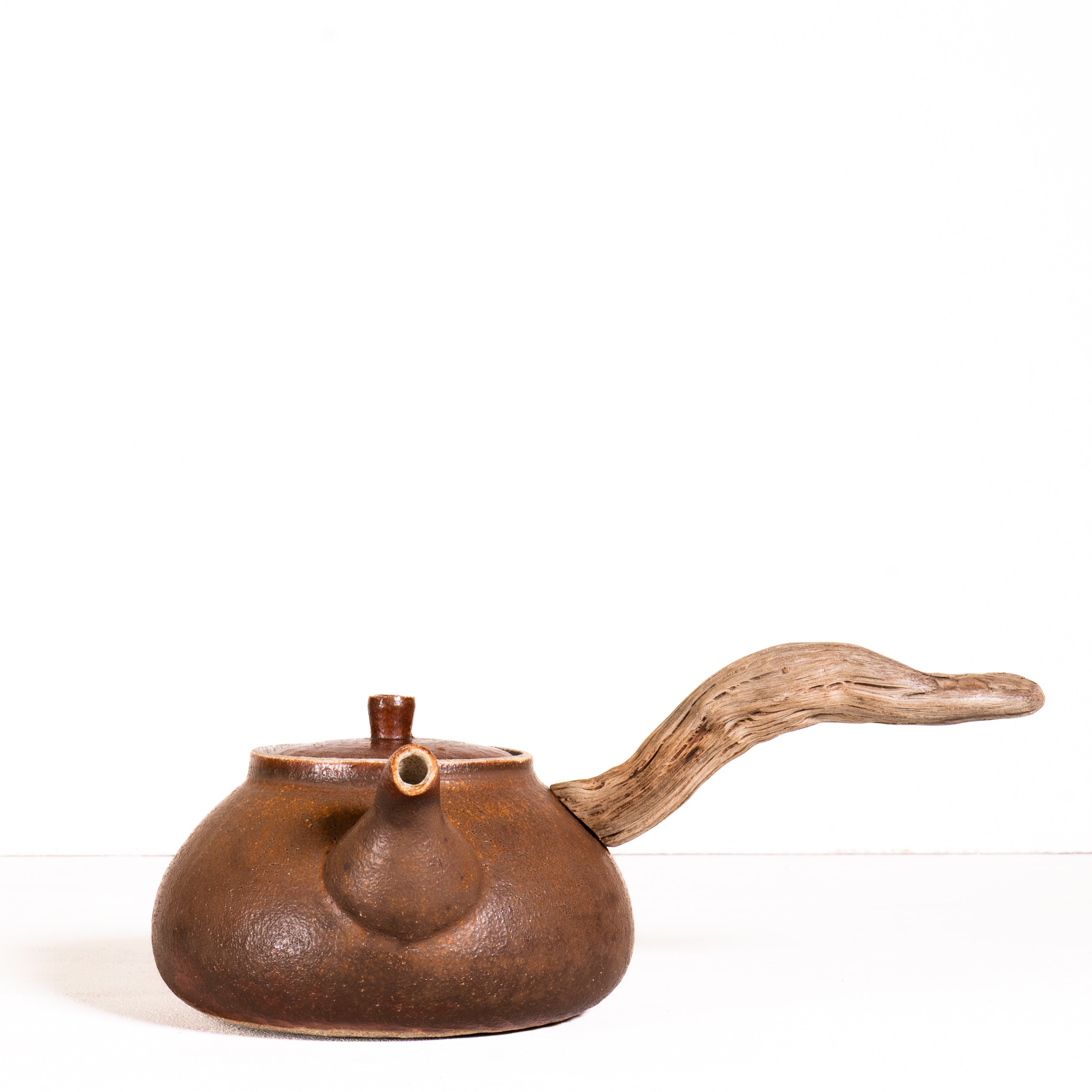 Wooden side handle teapot