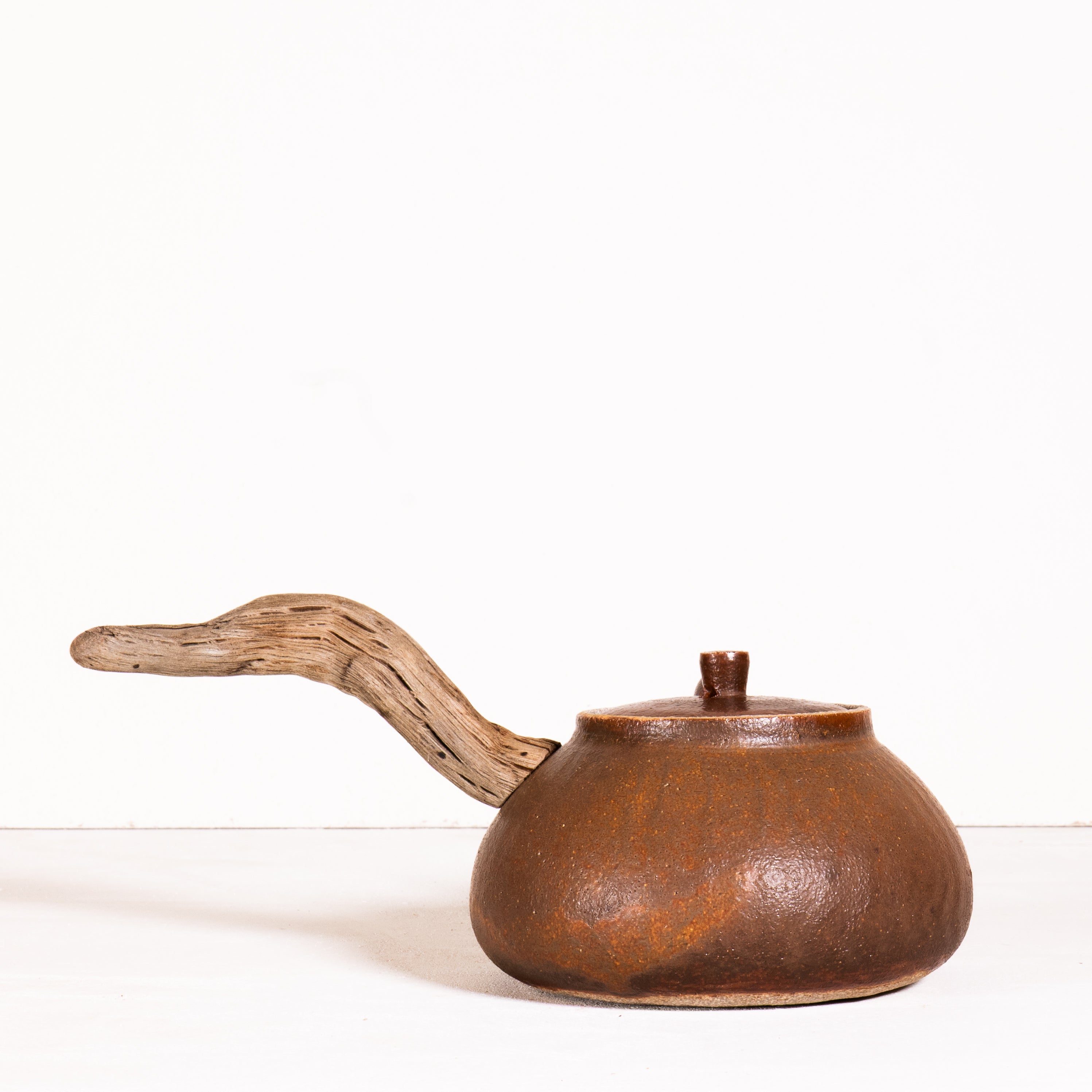 Wooden side handle teapot