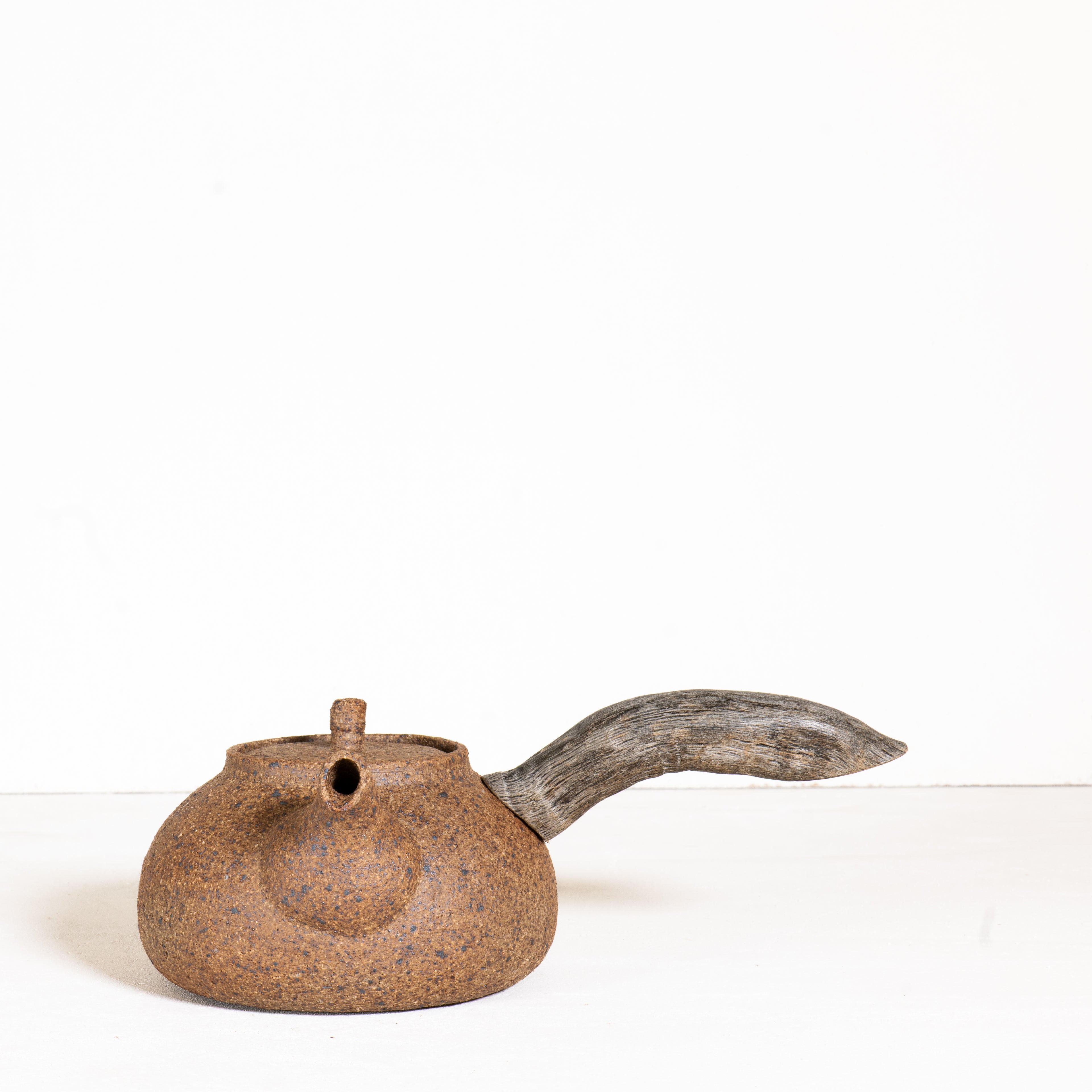 Wooden side handle teapot