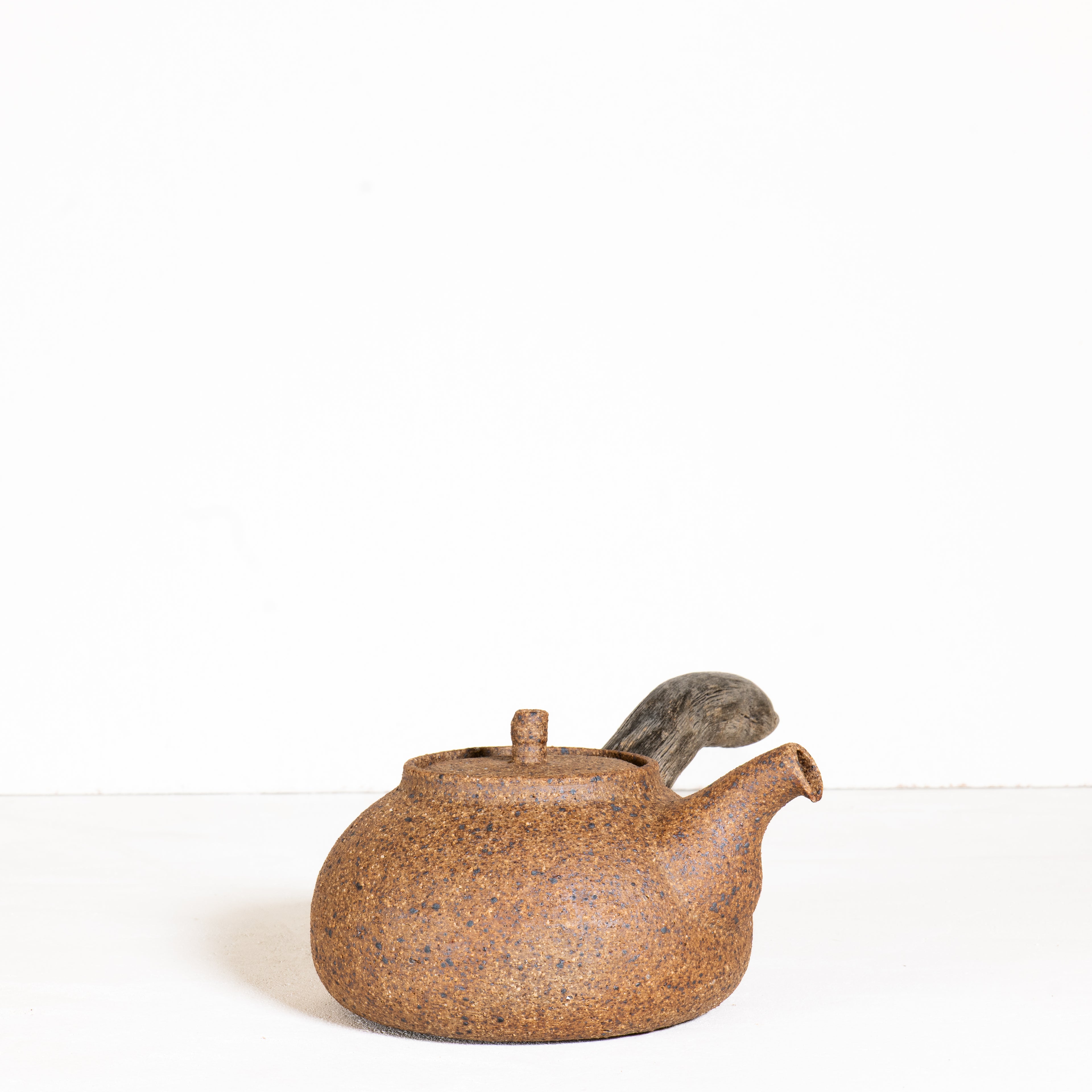 Wooden side handle teapot