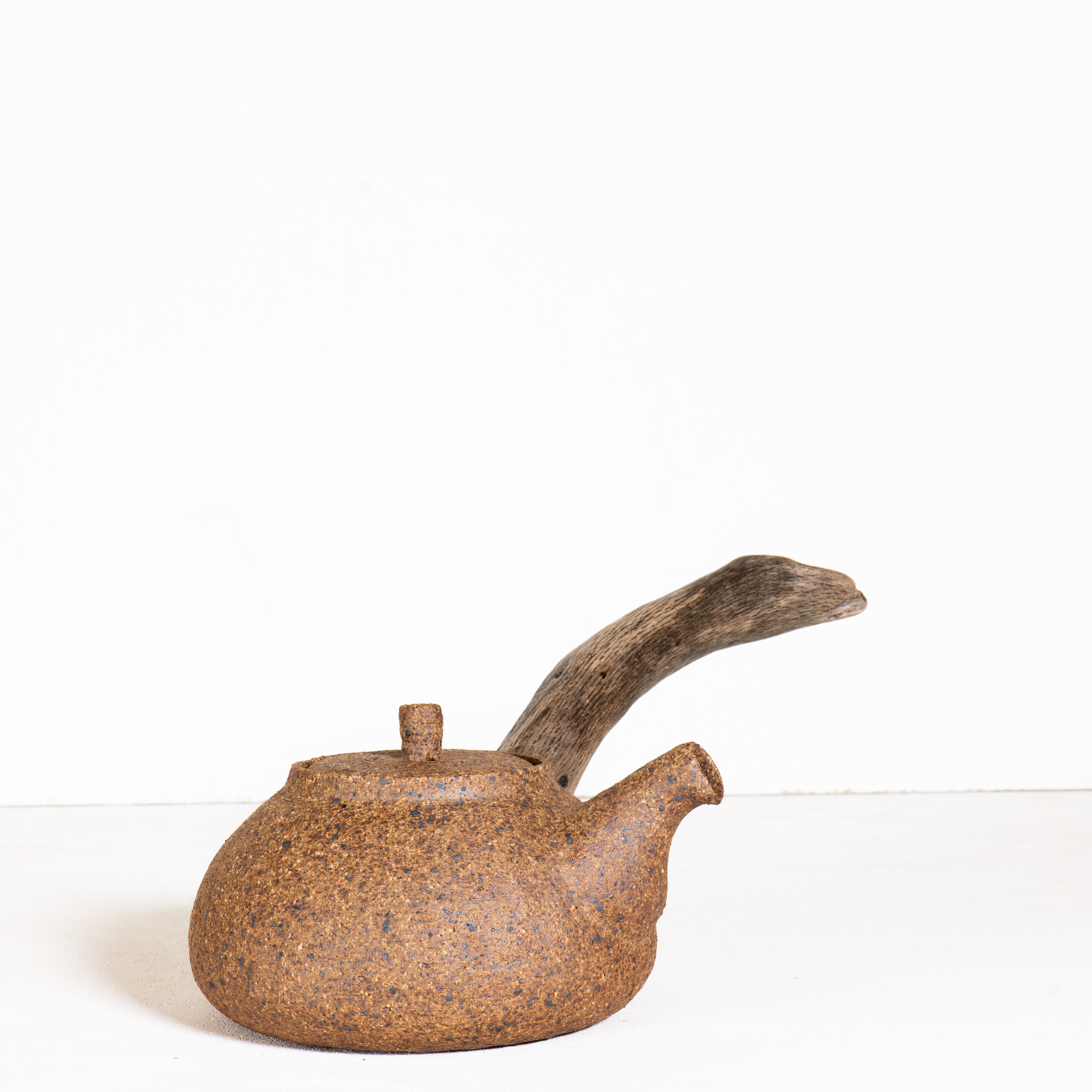 Wooden side handle teapot