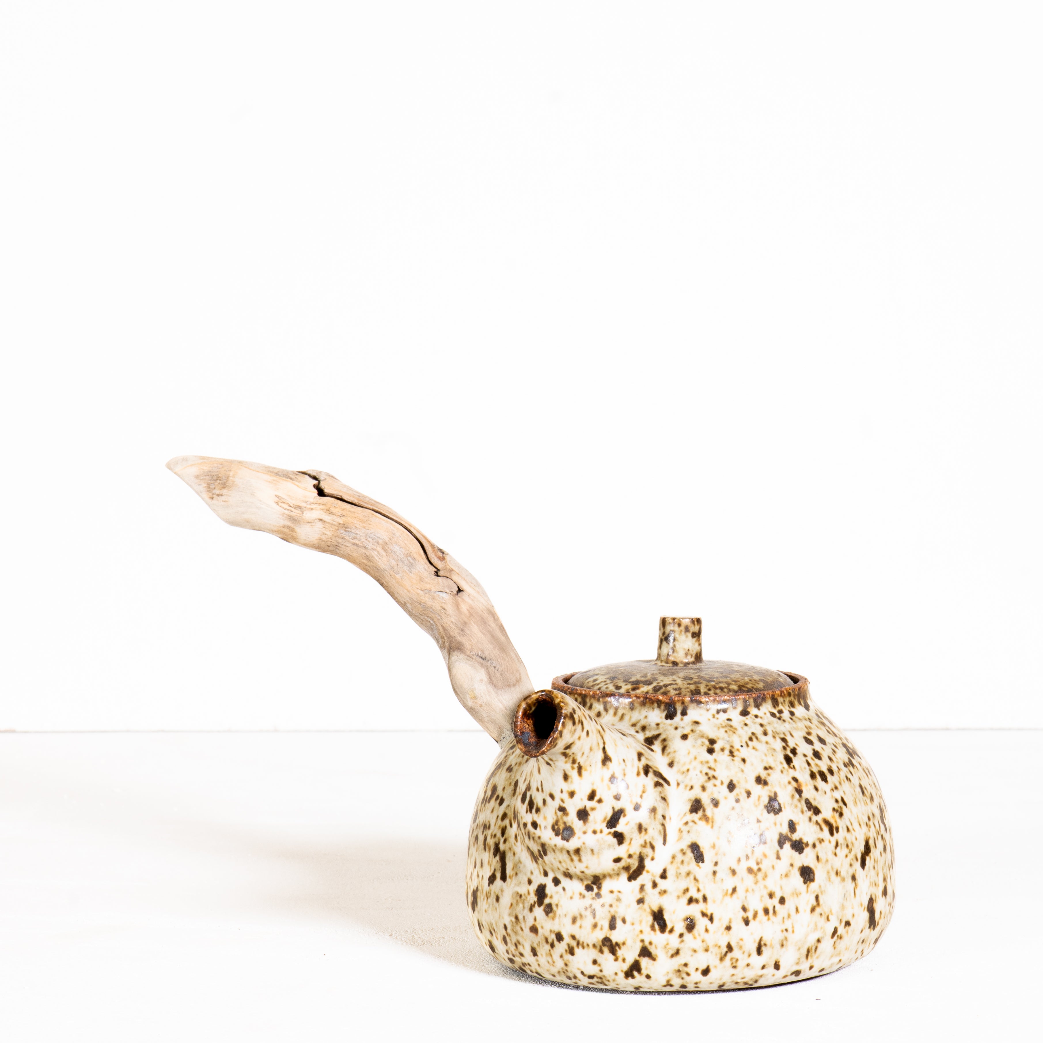 Left handed wooden side handle teapot