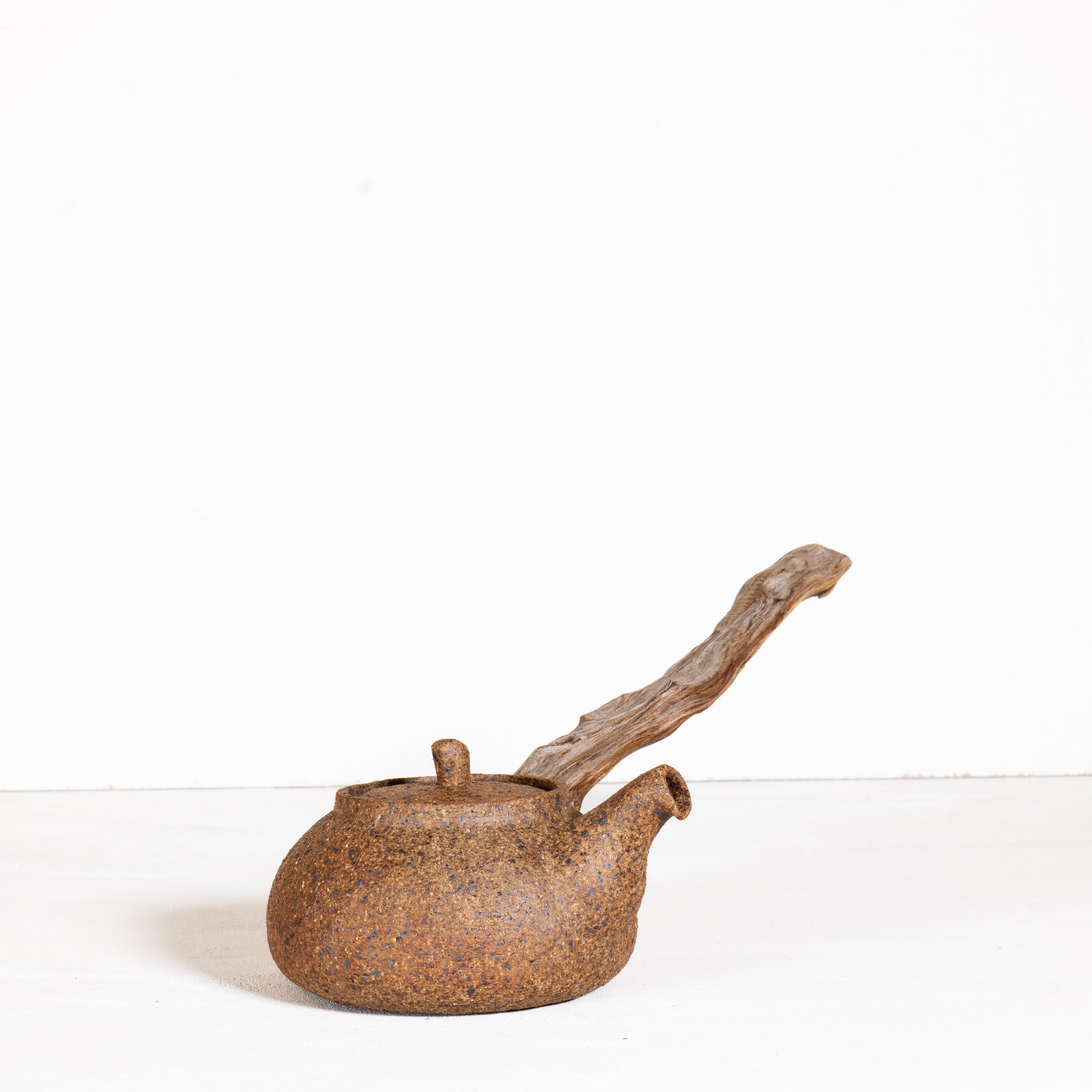 Wooden side handle teapot