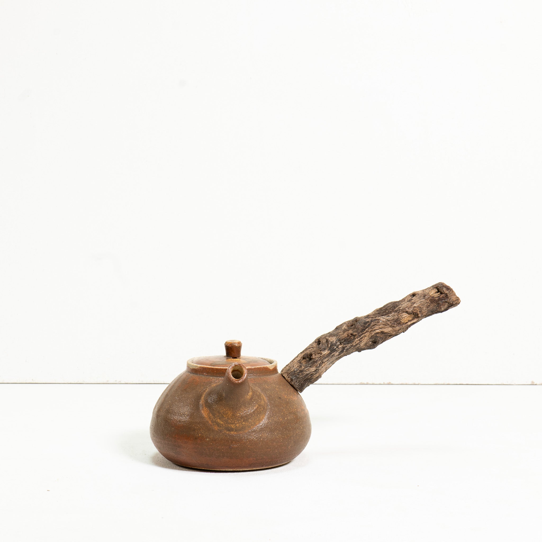Wooden side handle teapot