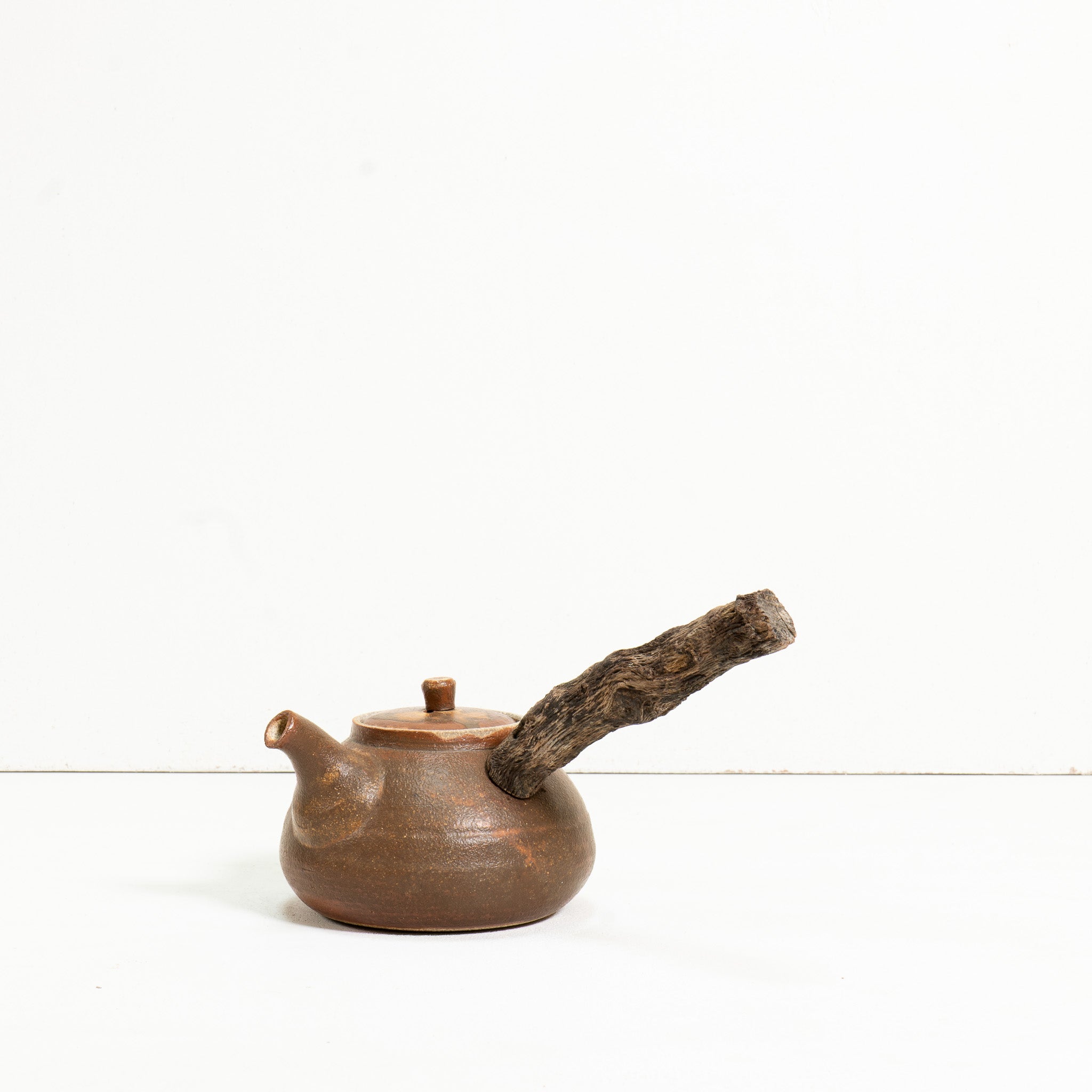 Wooden side handle teapot