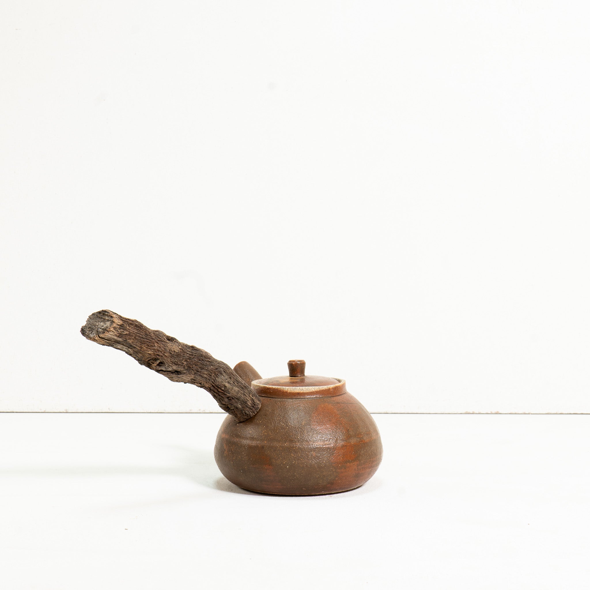 Wooden side handle teapot