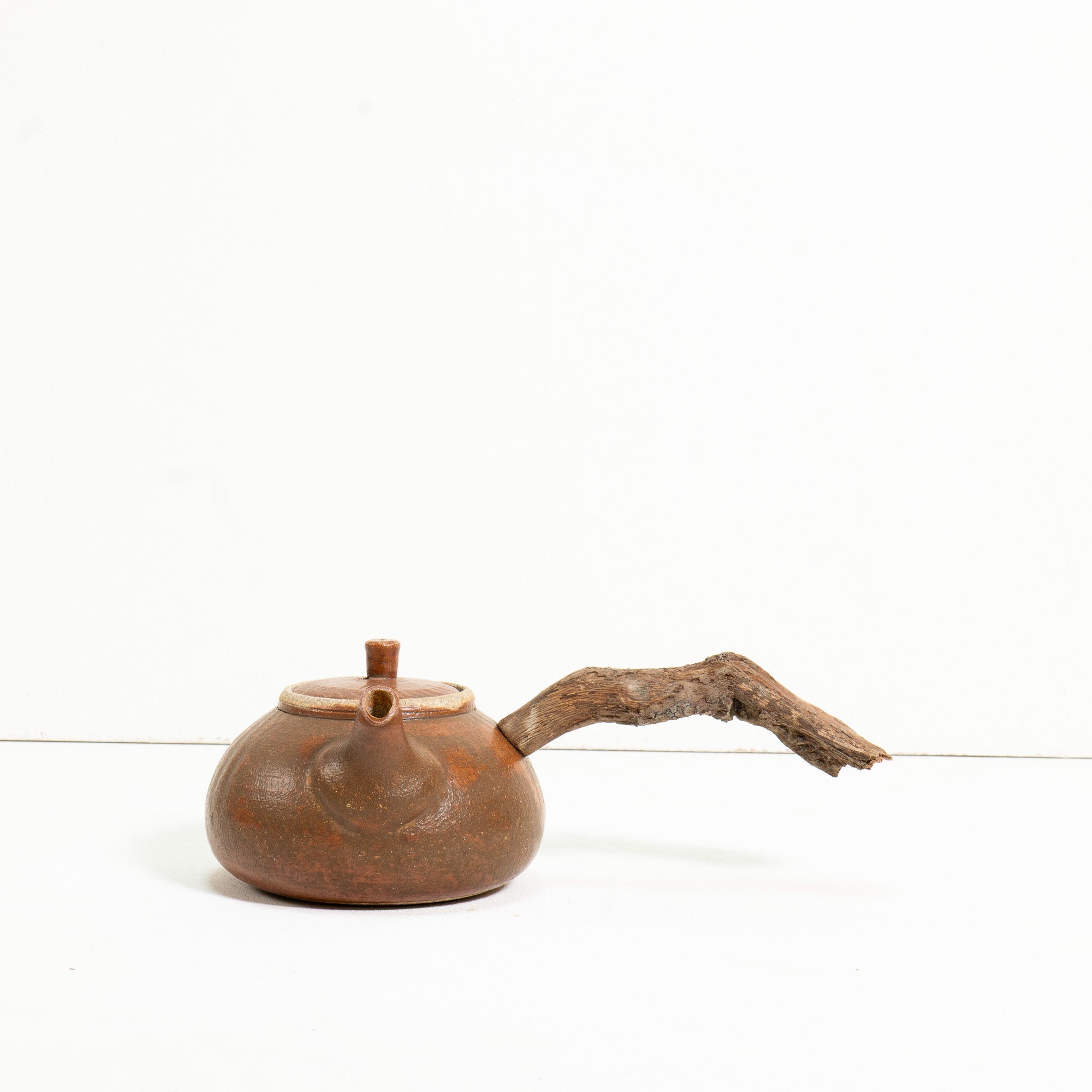 Wooden side handle teapot