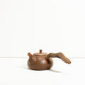 Wooden side handle teapot