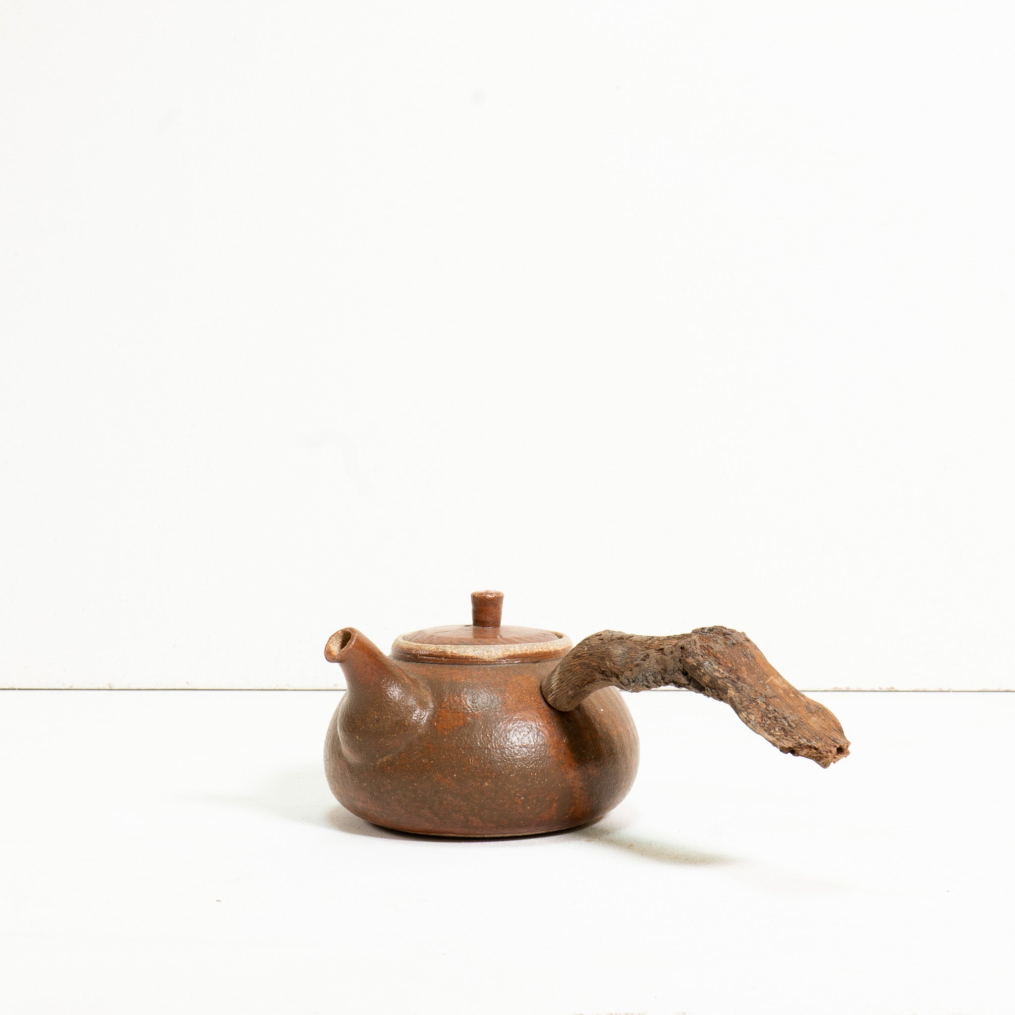 Wooden side handle teapot
