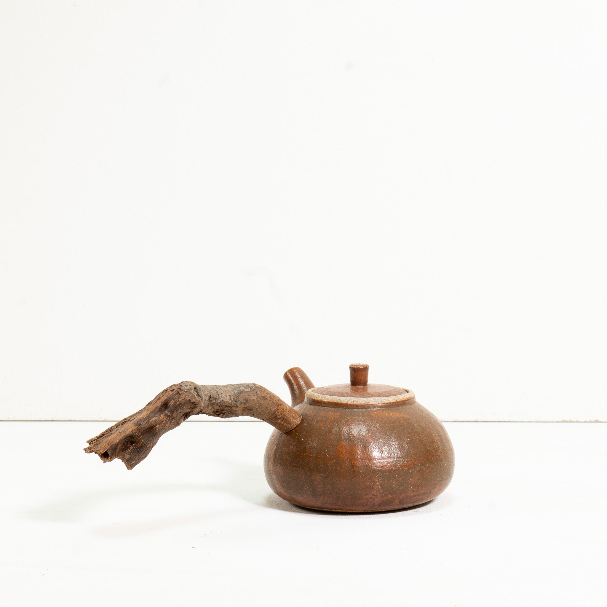Wooden side handle teapot