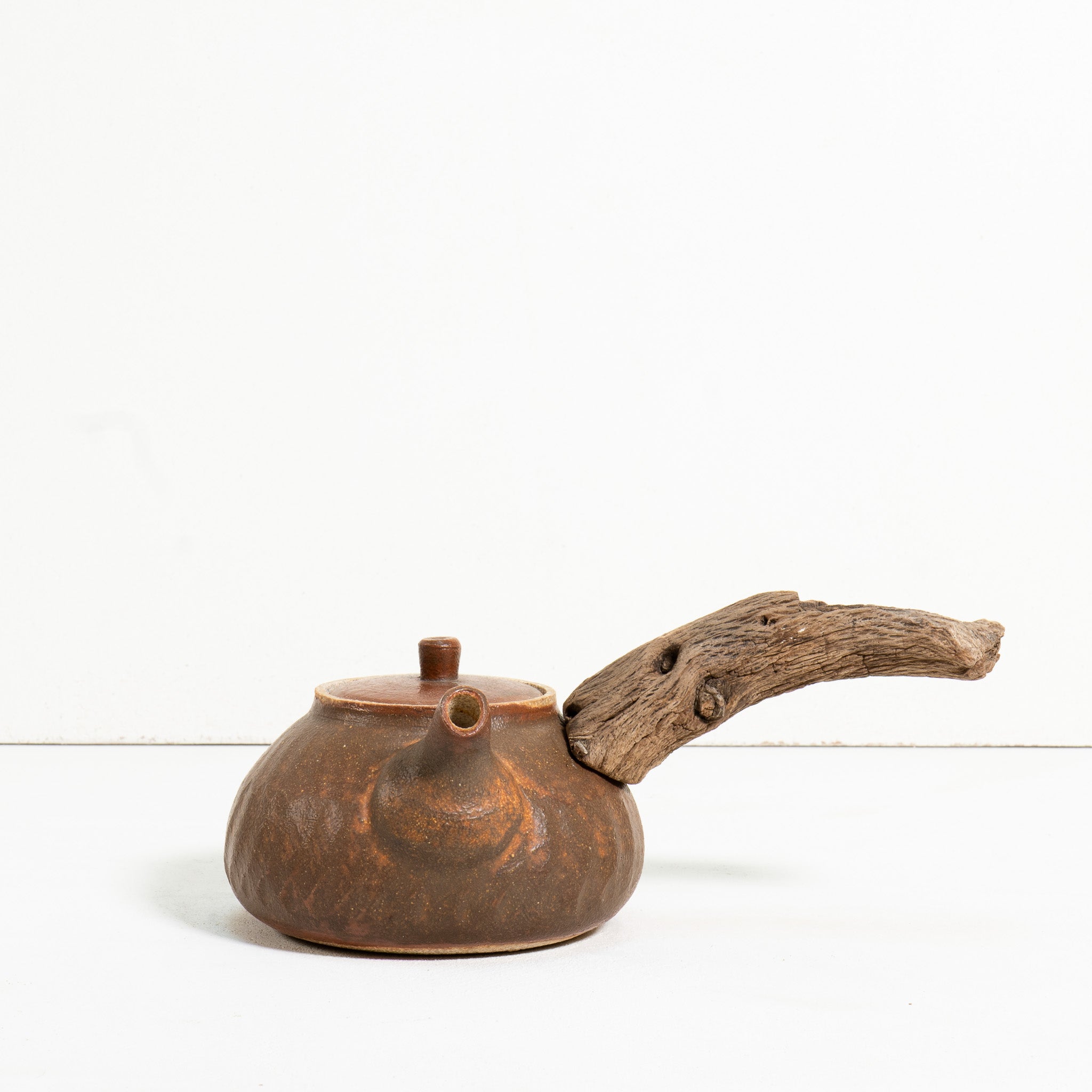 Wooden side handle teapot