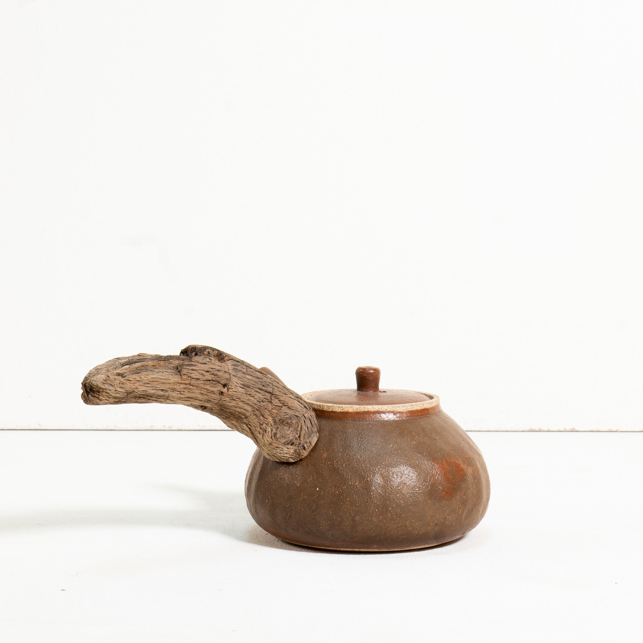 Wooden side handle teapot