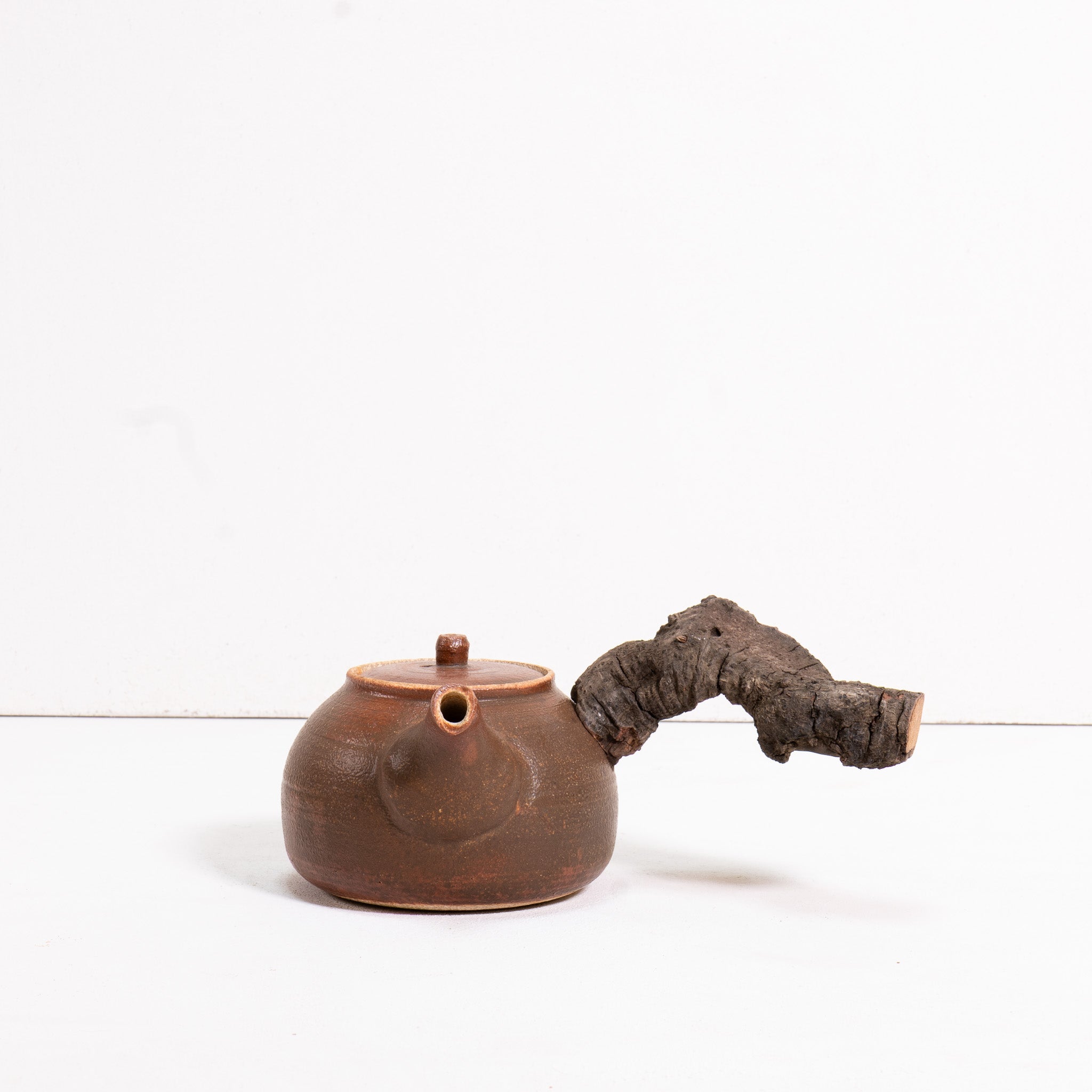 Wooden side handle teapot