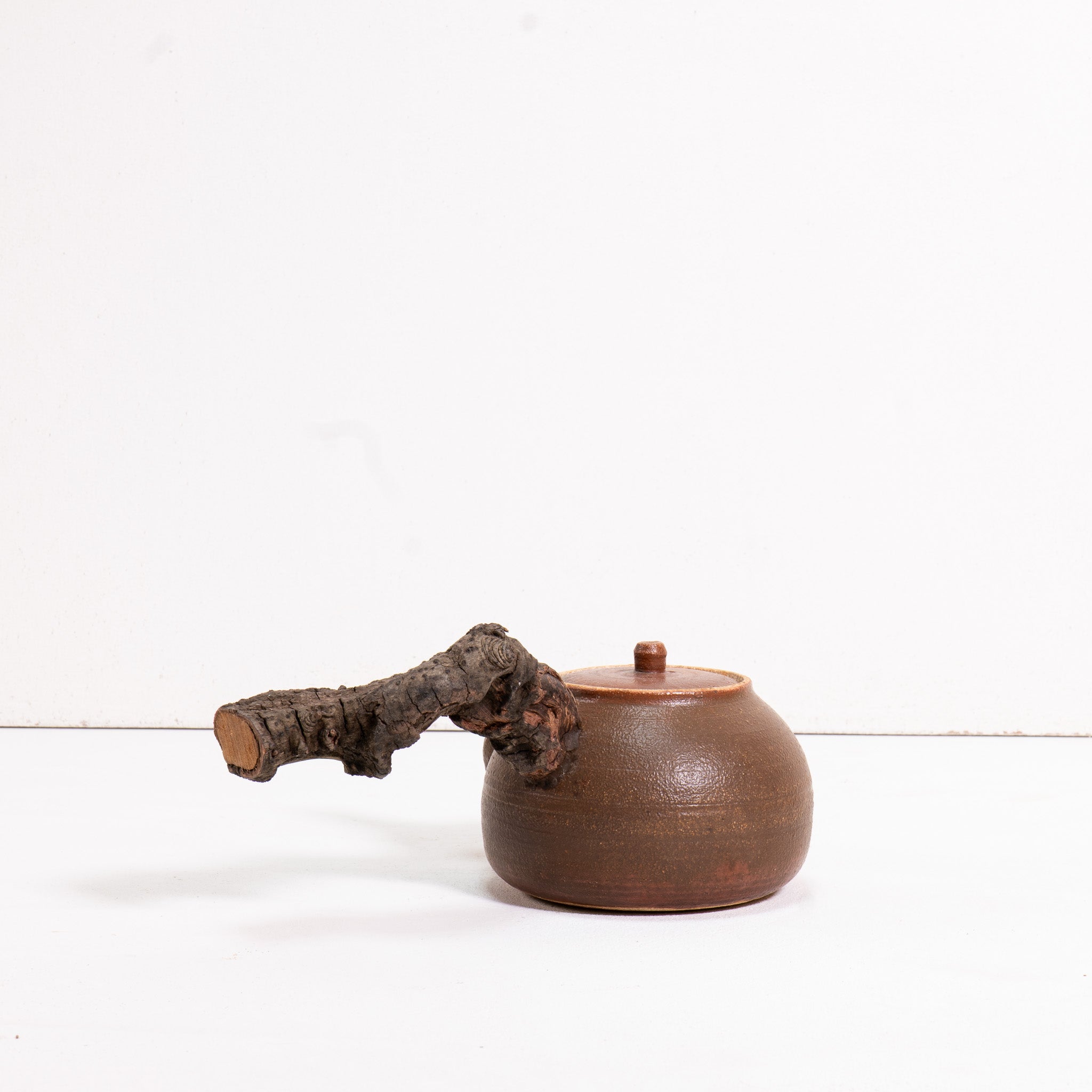 Wooden side handle teapot