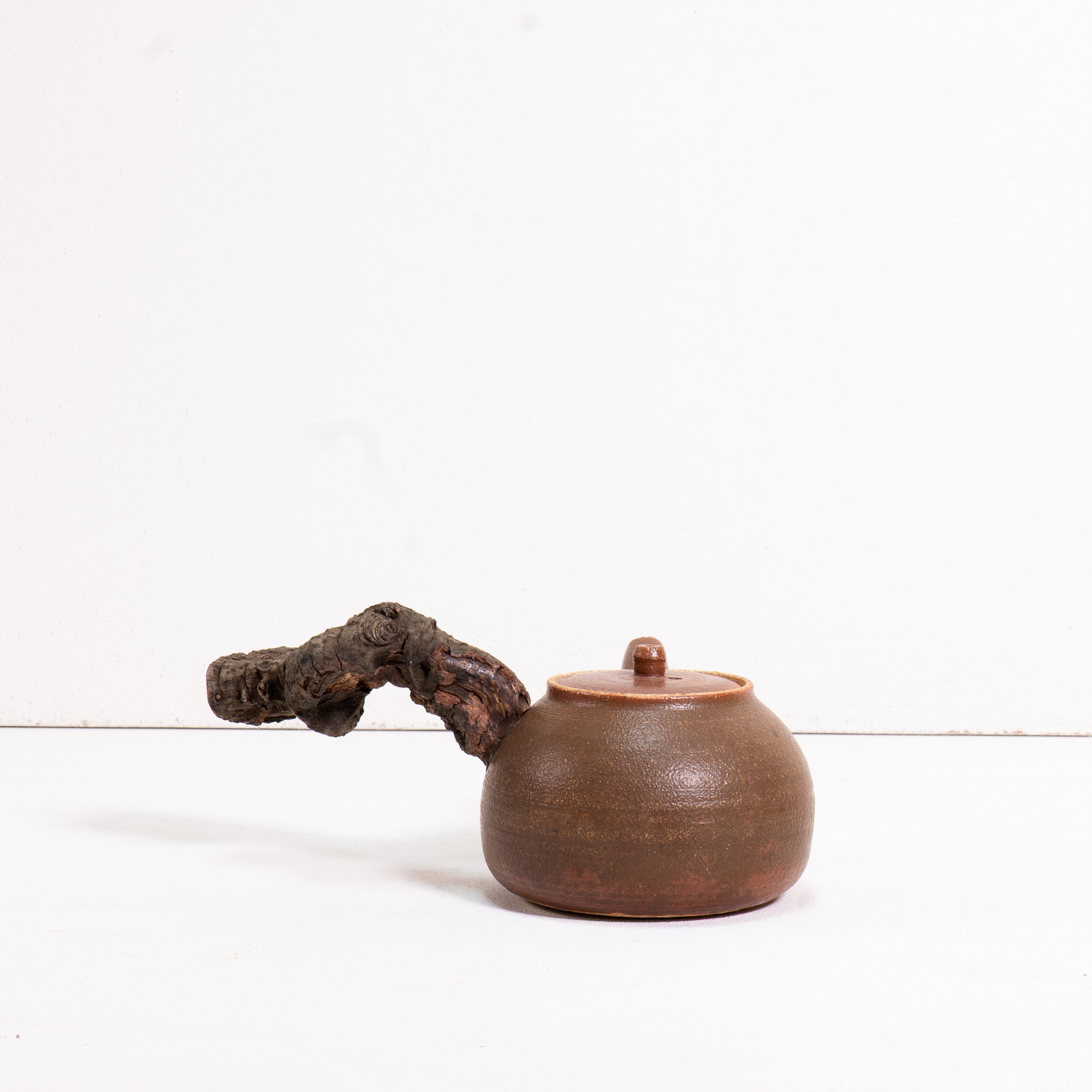 Wooden side handle teapot