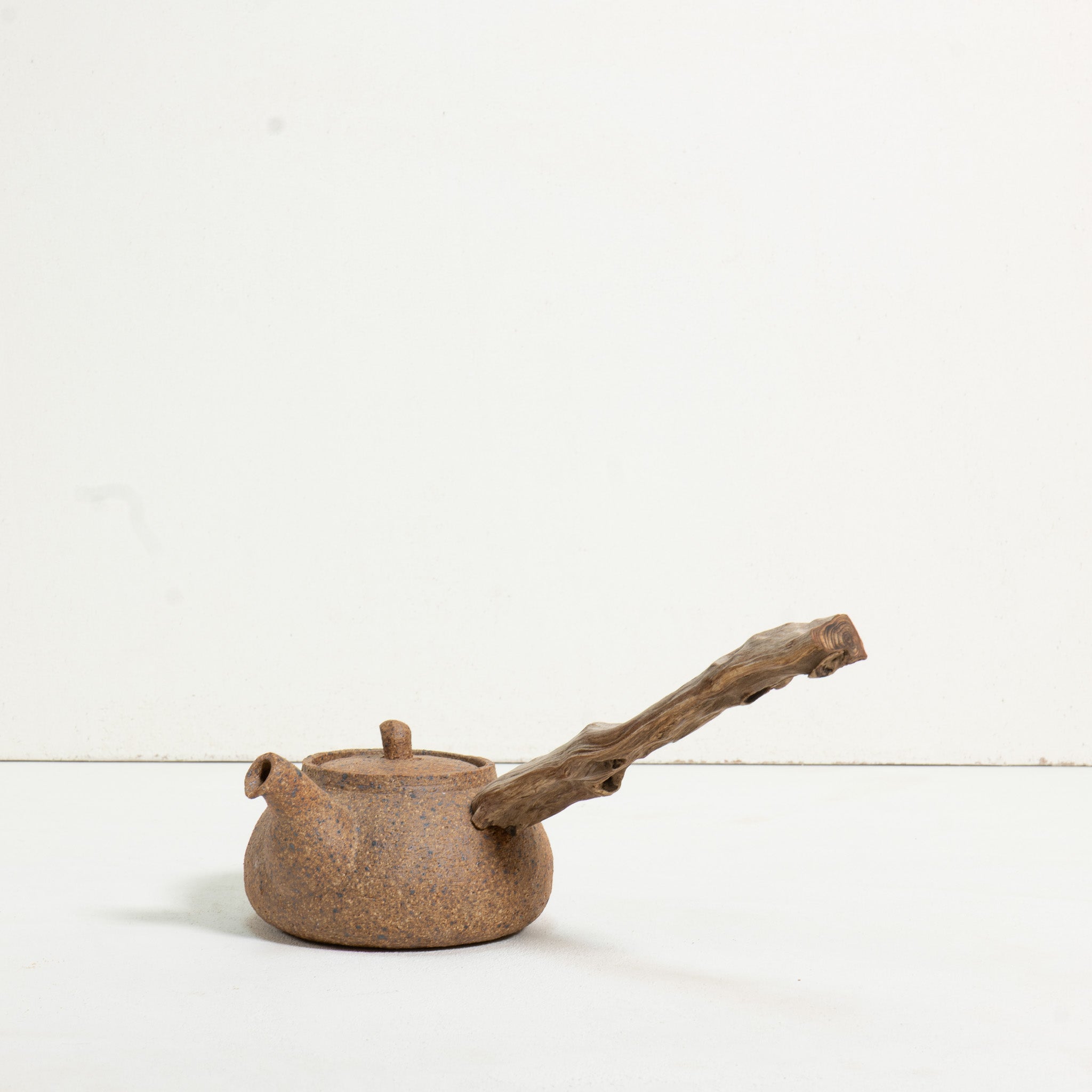 Wooden side handle teapot