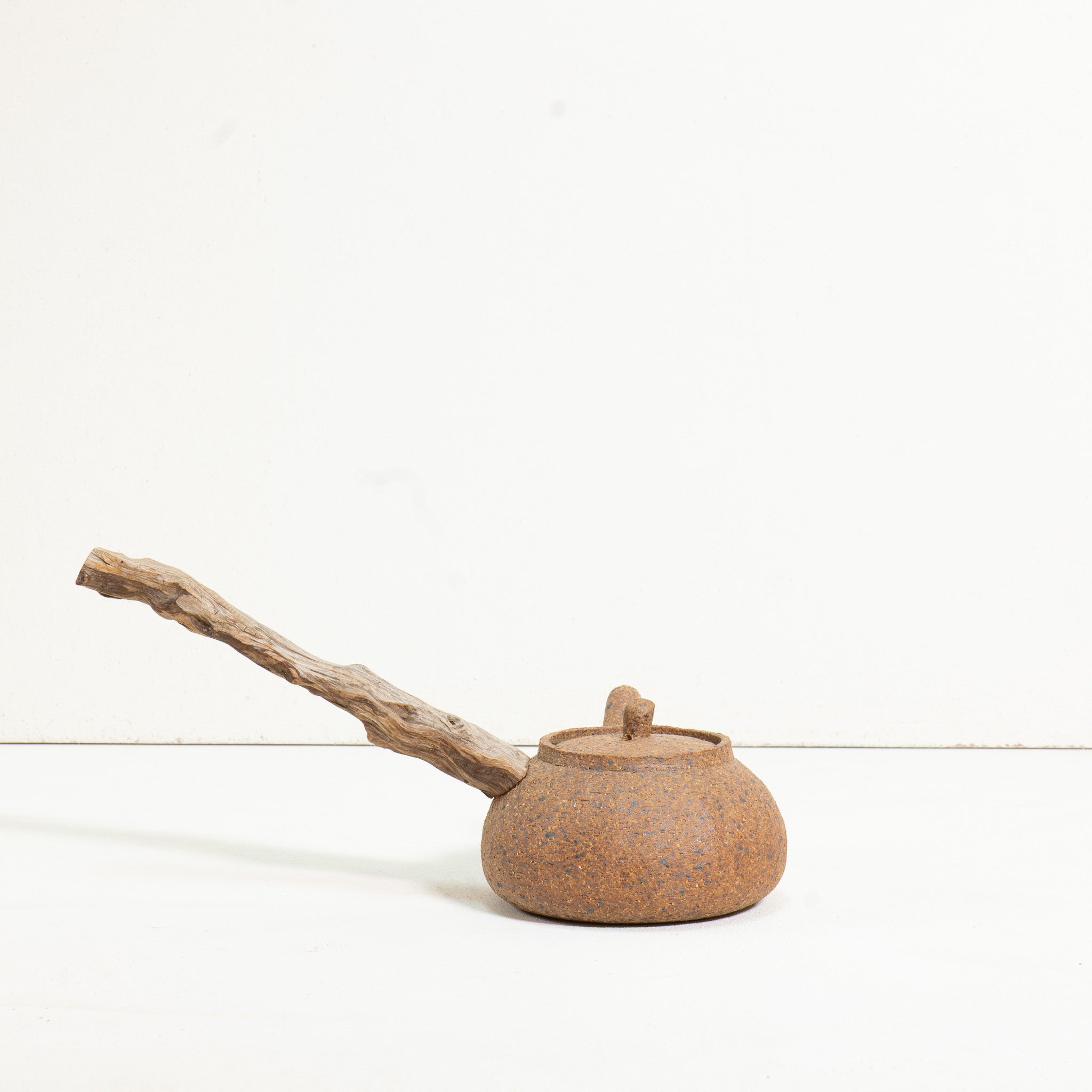 Wooden side handle teapot