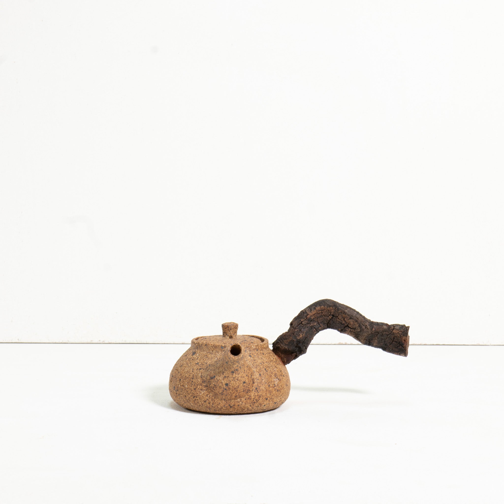 Wooden side handle teapot
