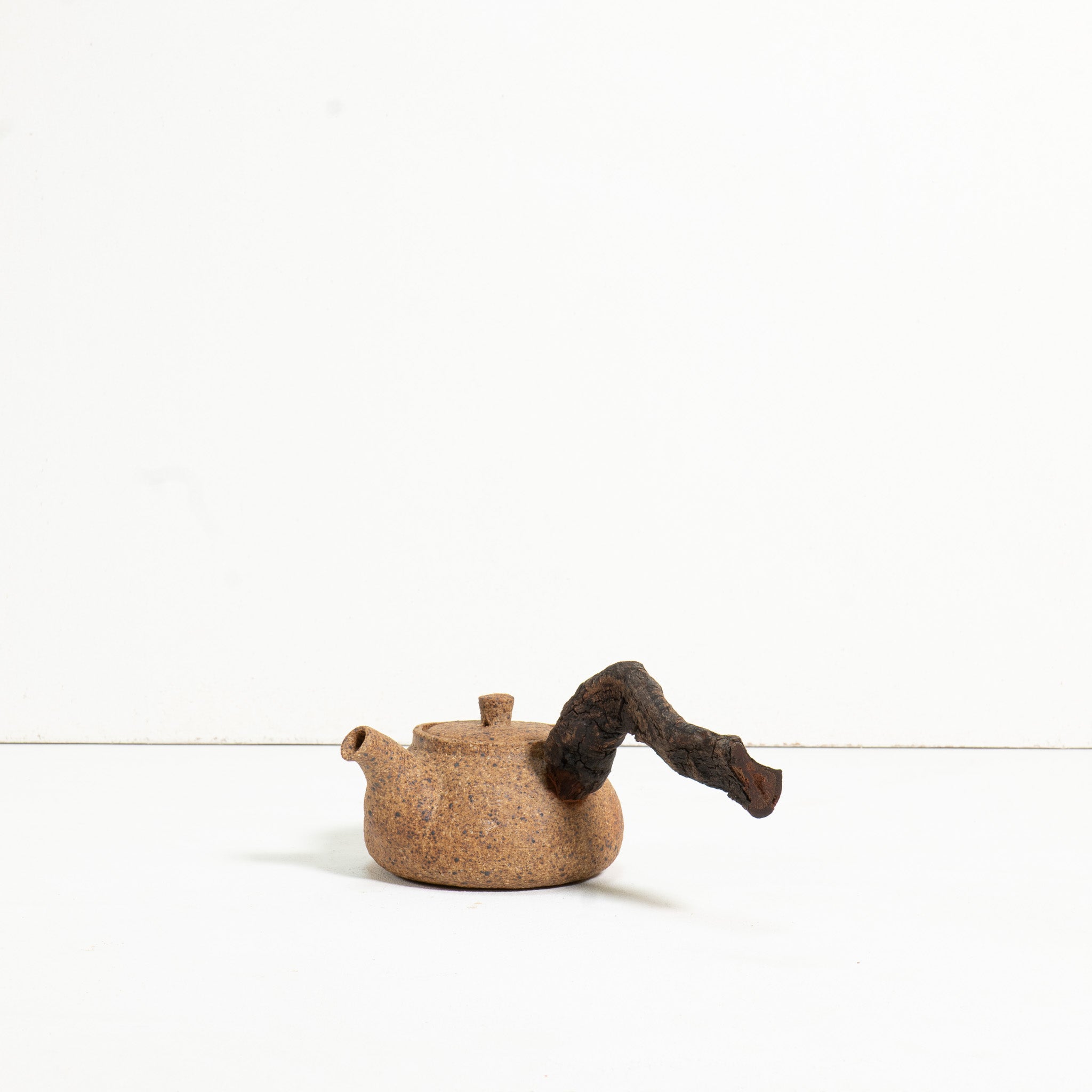 Wooden side handle teapot