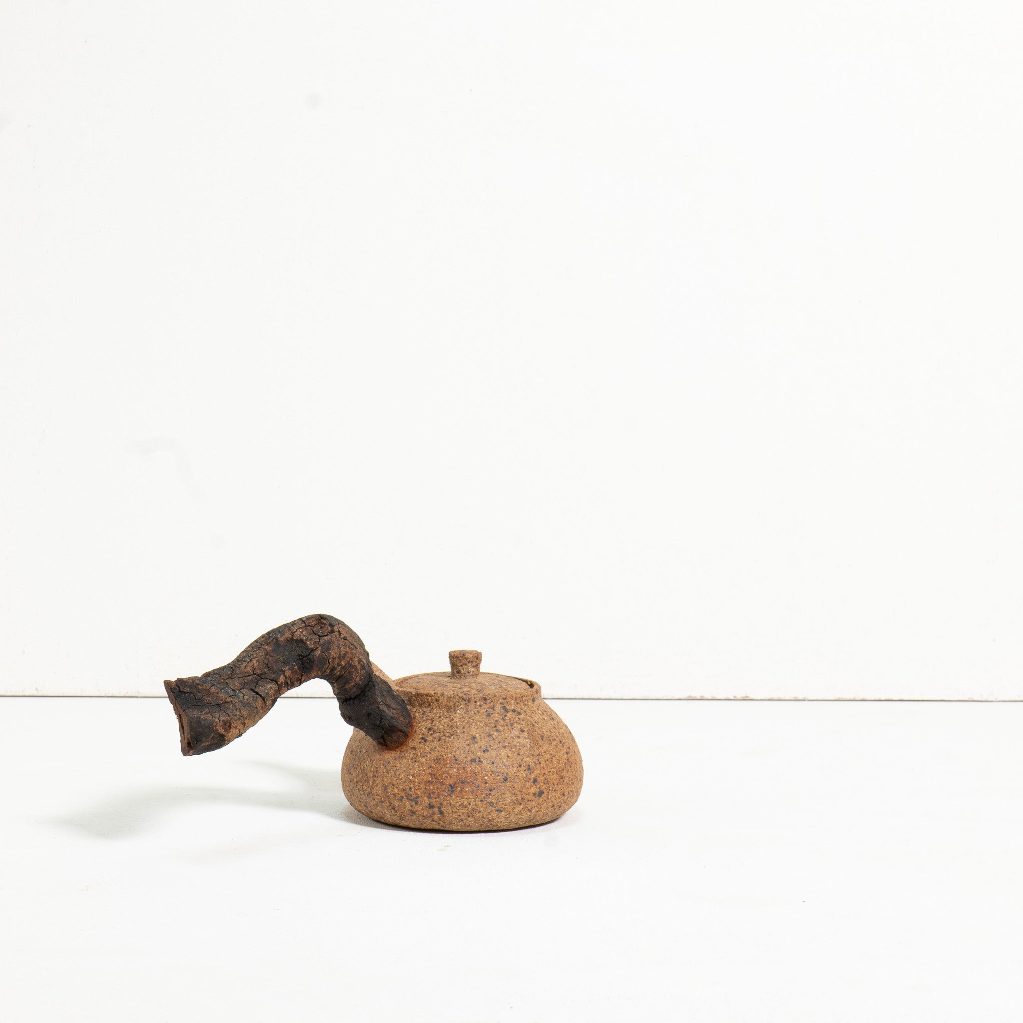 Wooden side handle teapot