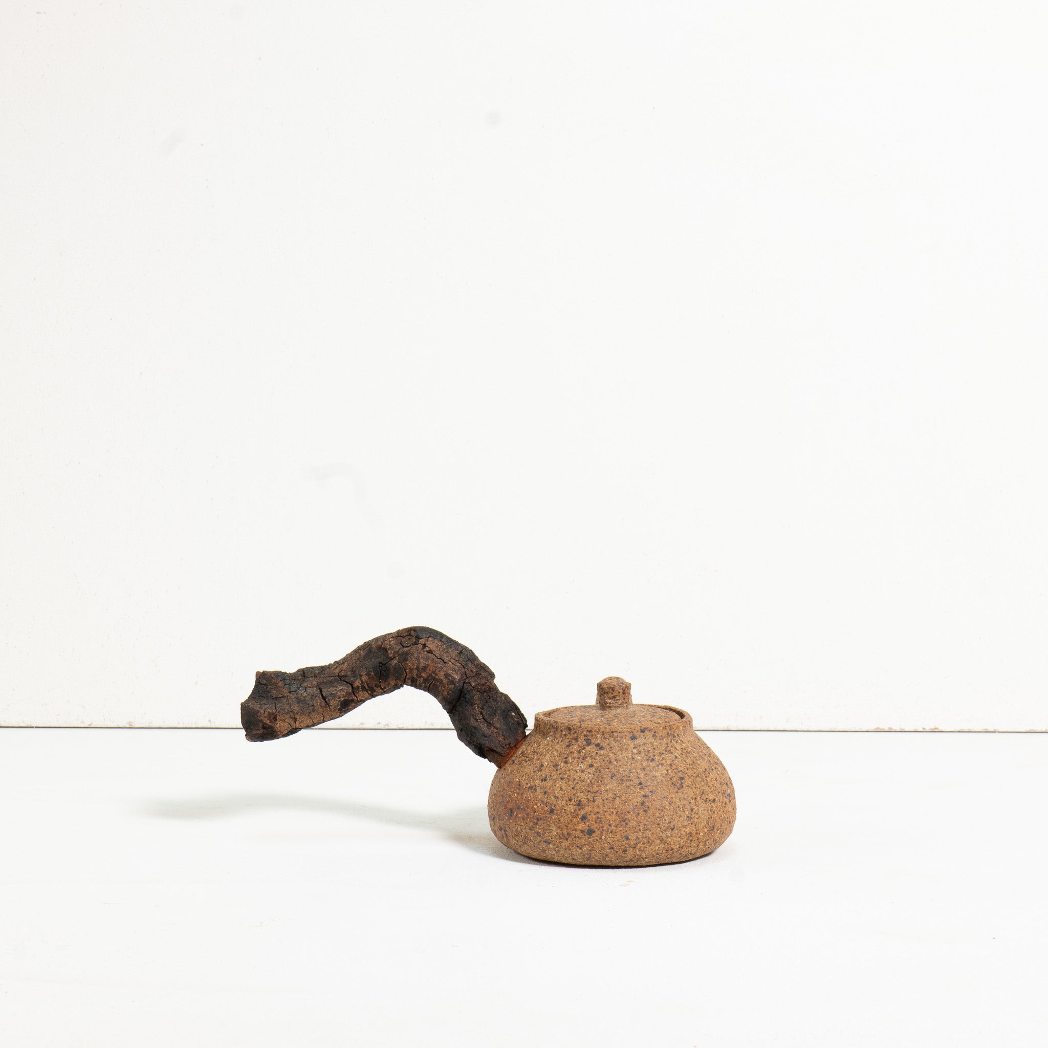 Wooden side handle teapot