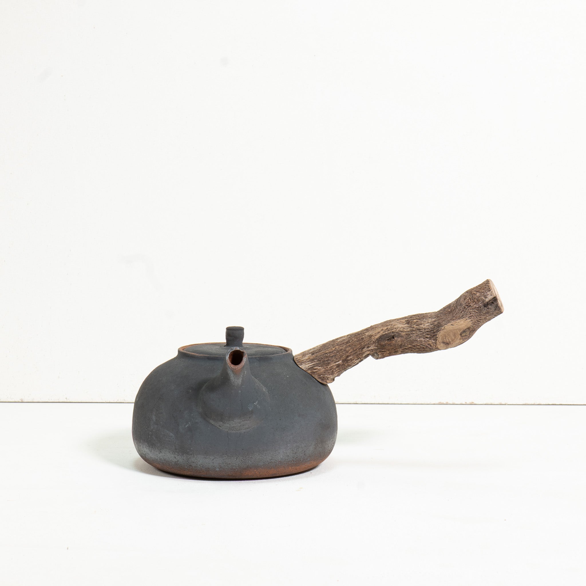 Wooden side handle flameware teapot