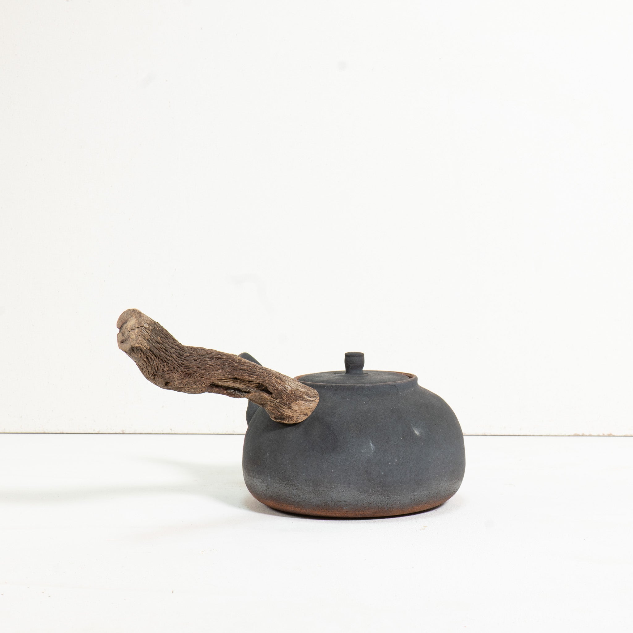 Wooden side handle flameware teapot