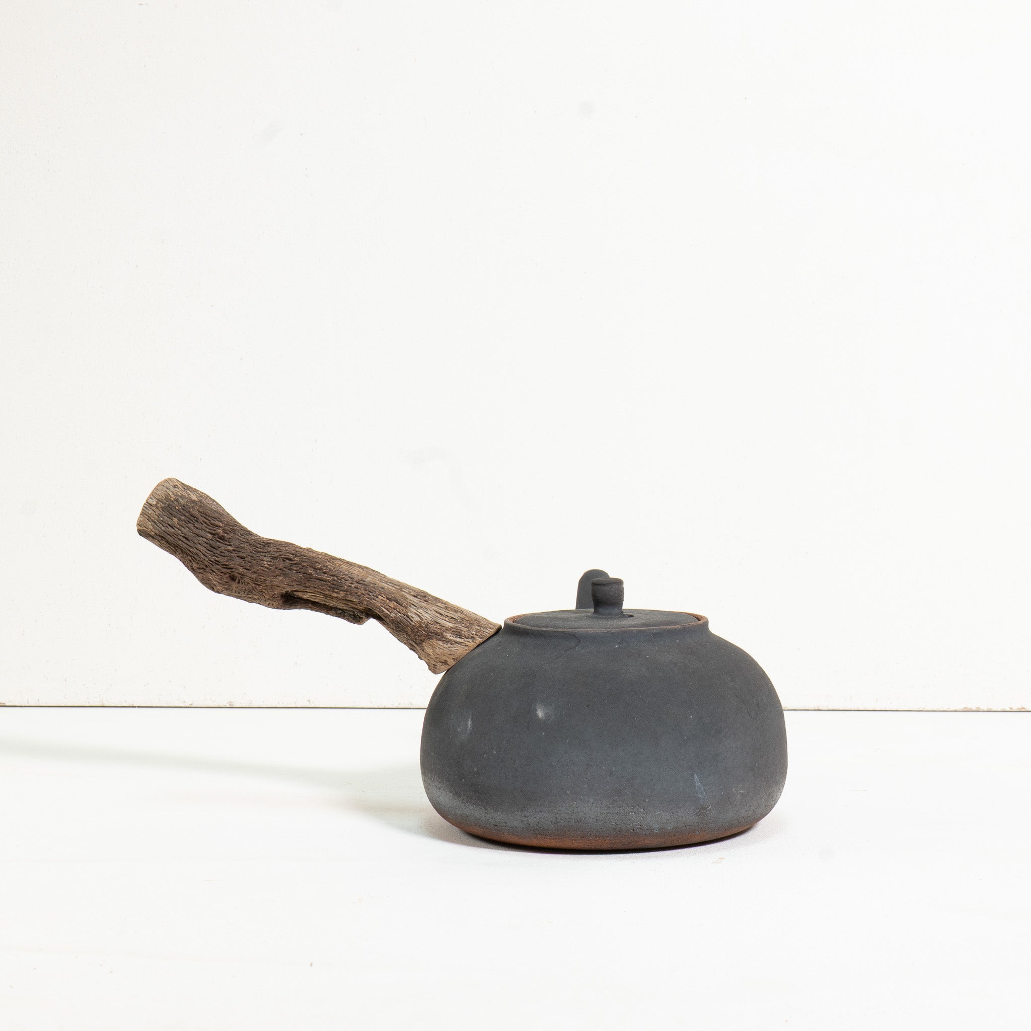 Wooden side handle flameware teapot