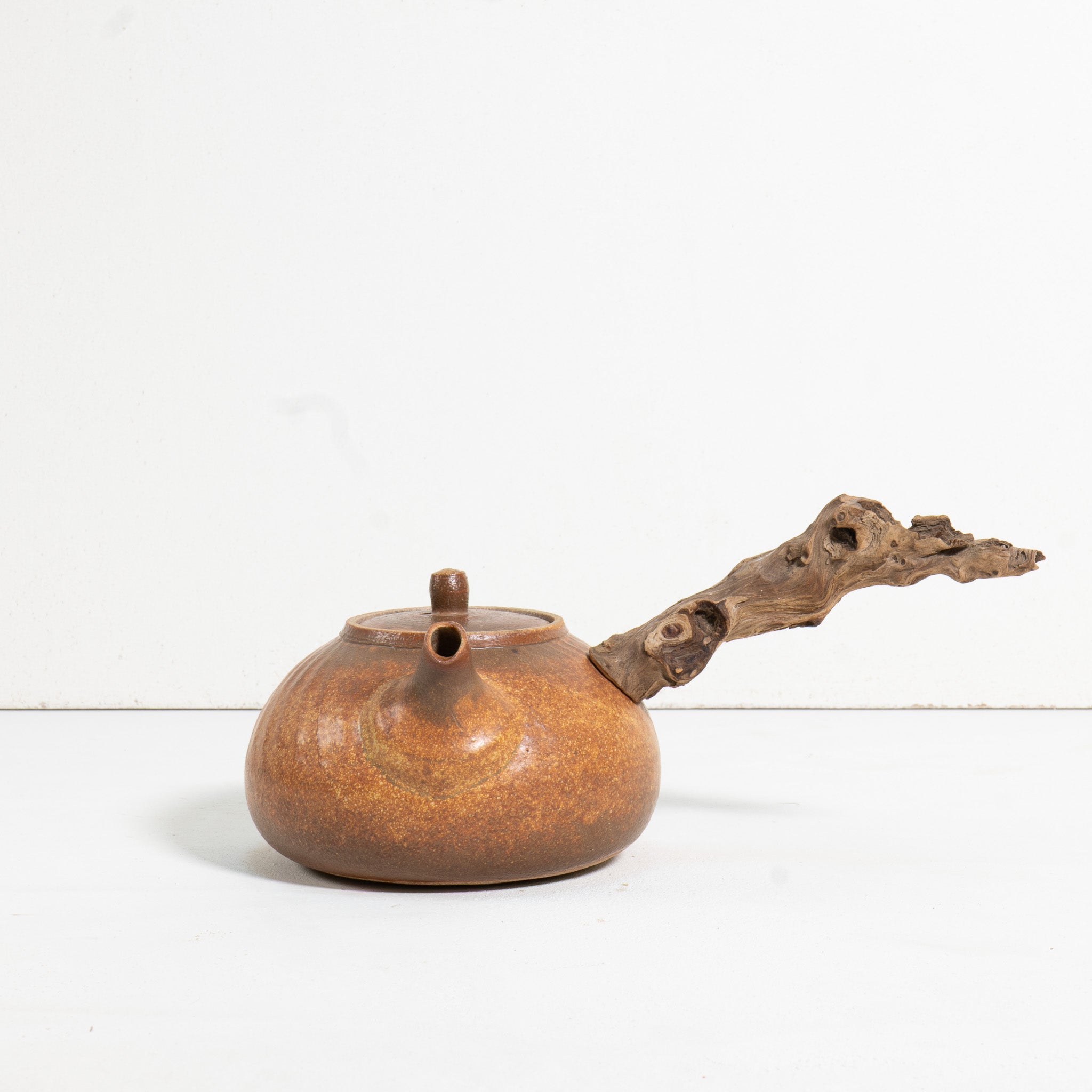 Wooden side handle teapot