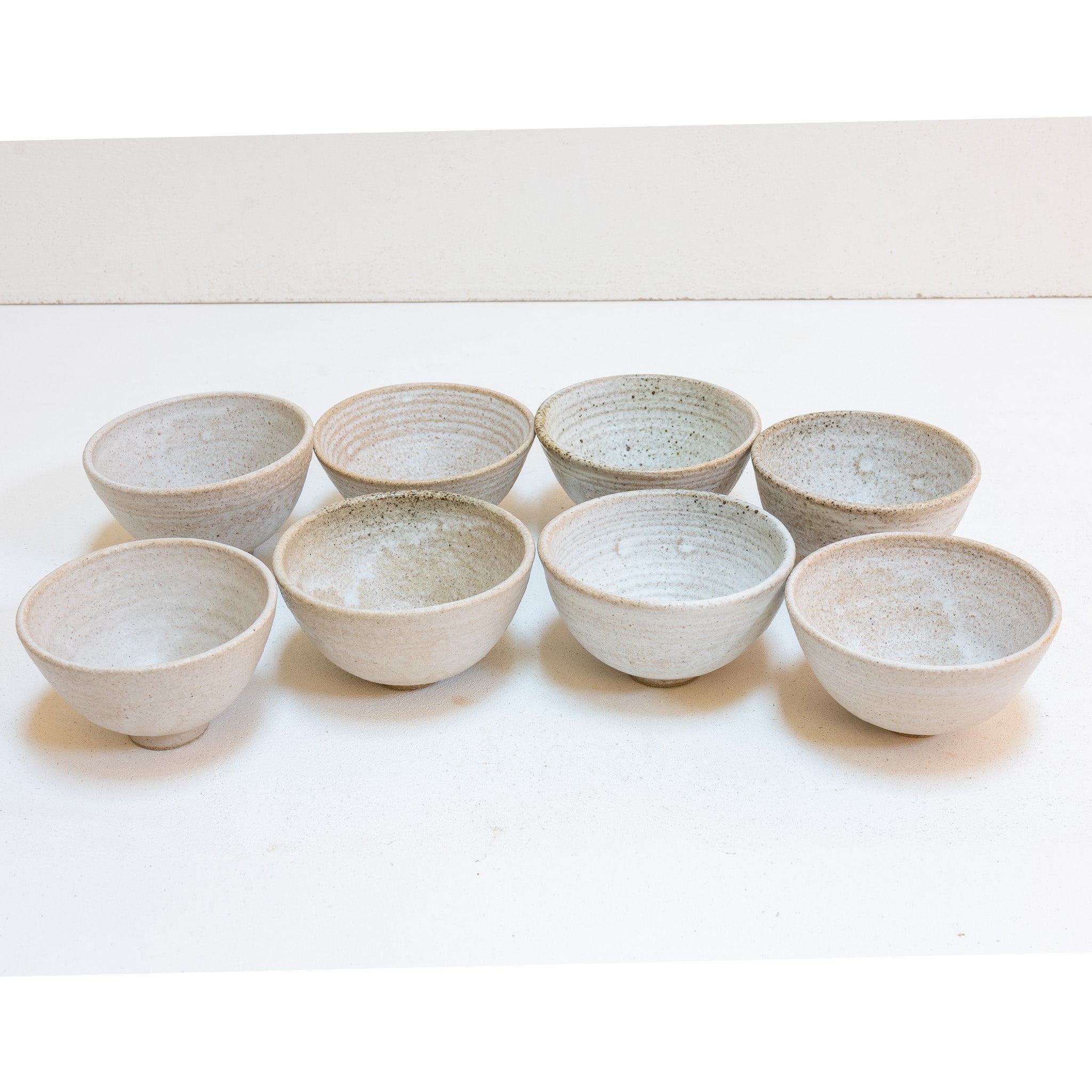 Set of 8 brutal white tea bowls
