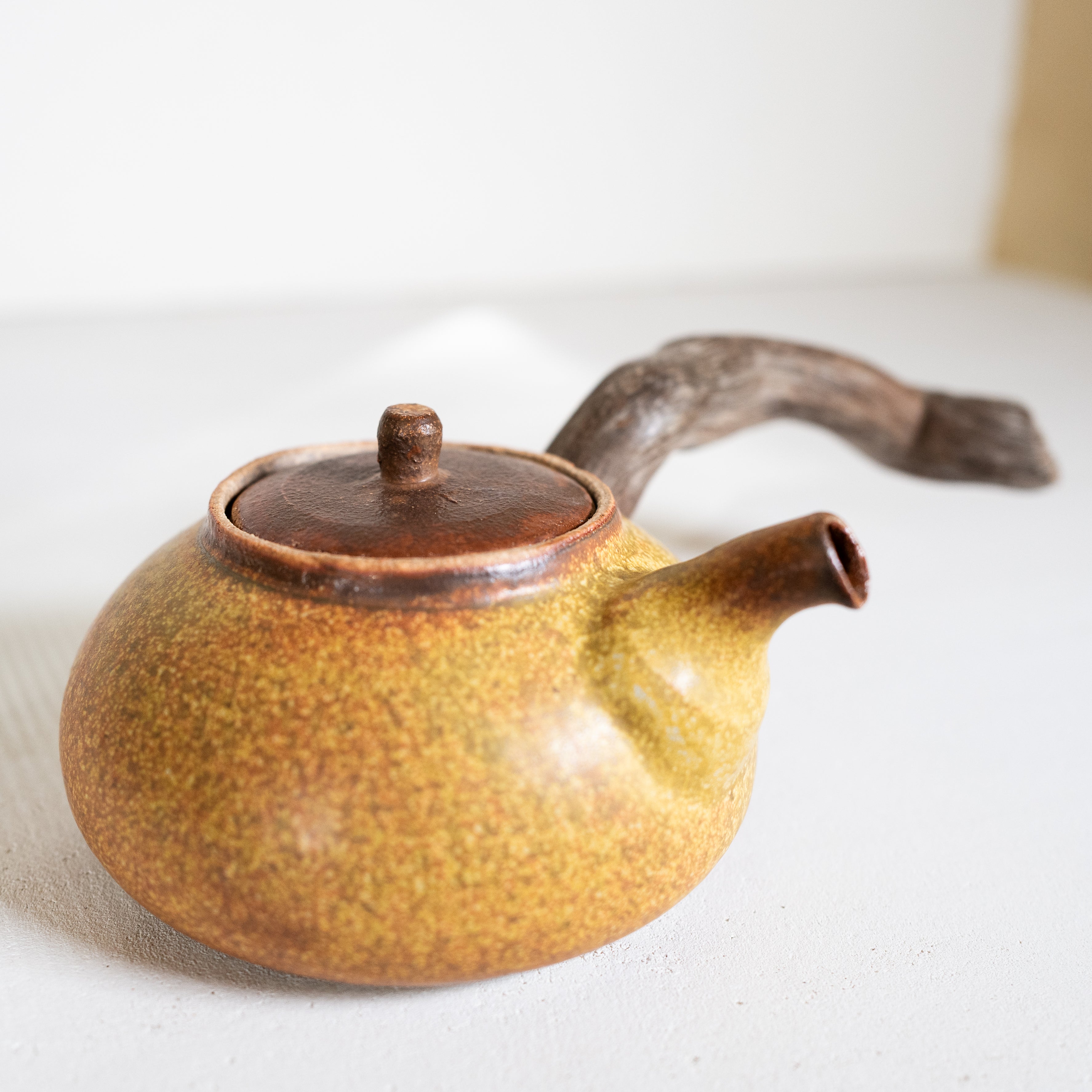 Wooden side handle teapot