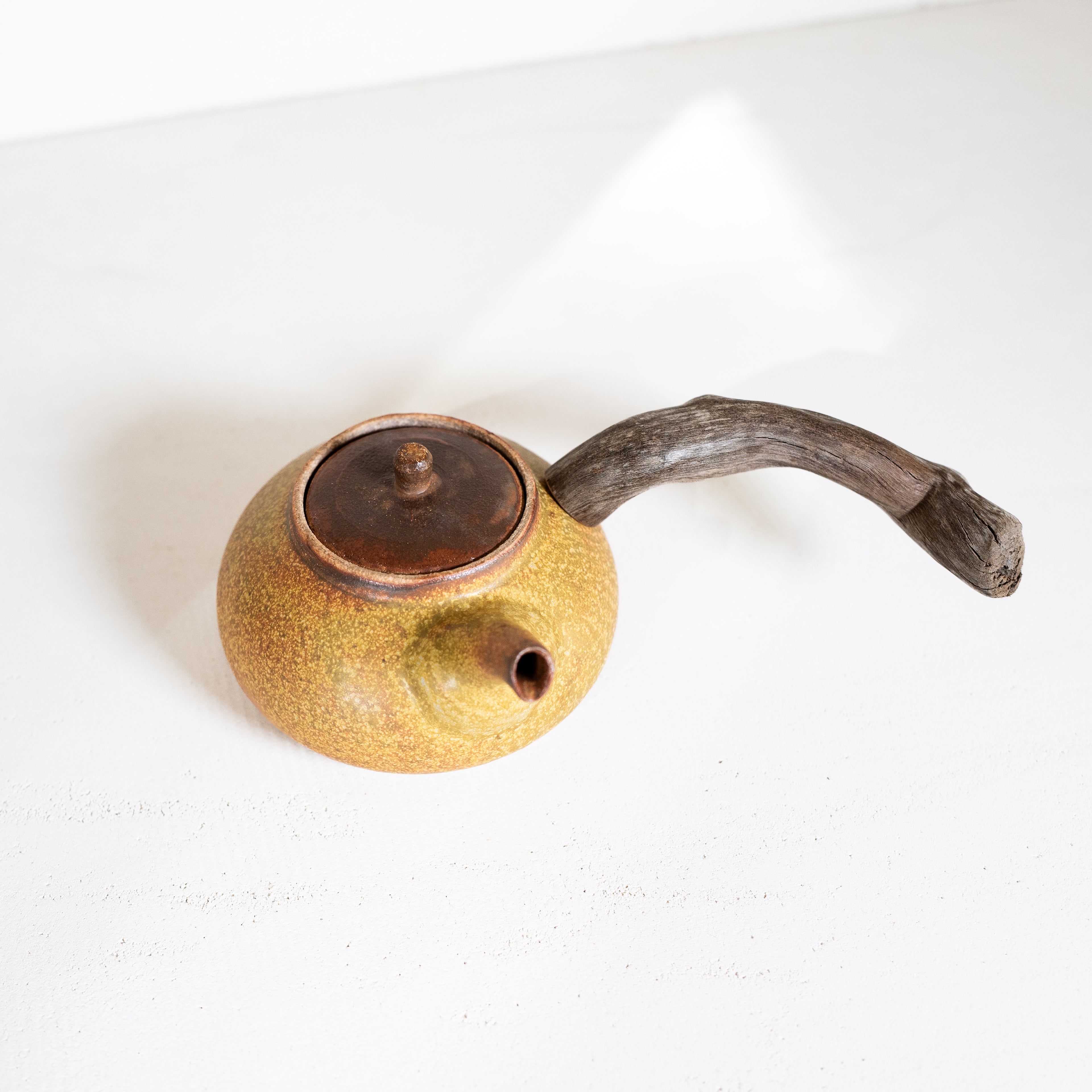 Wooden side handle teapot