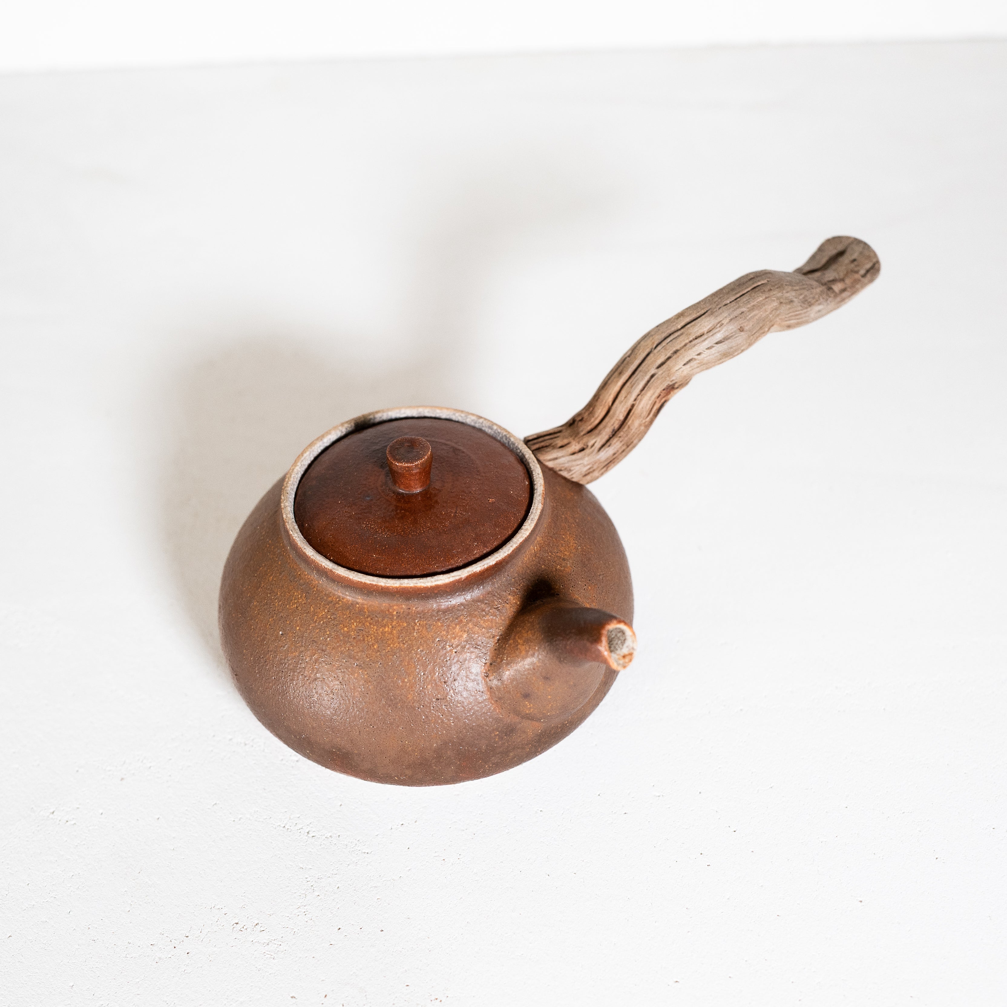 Wooden side handle teapot