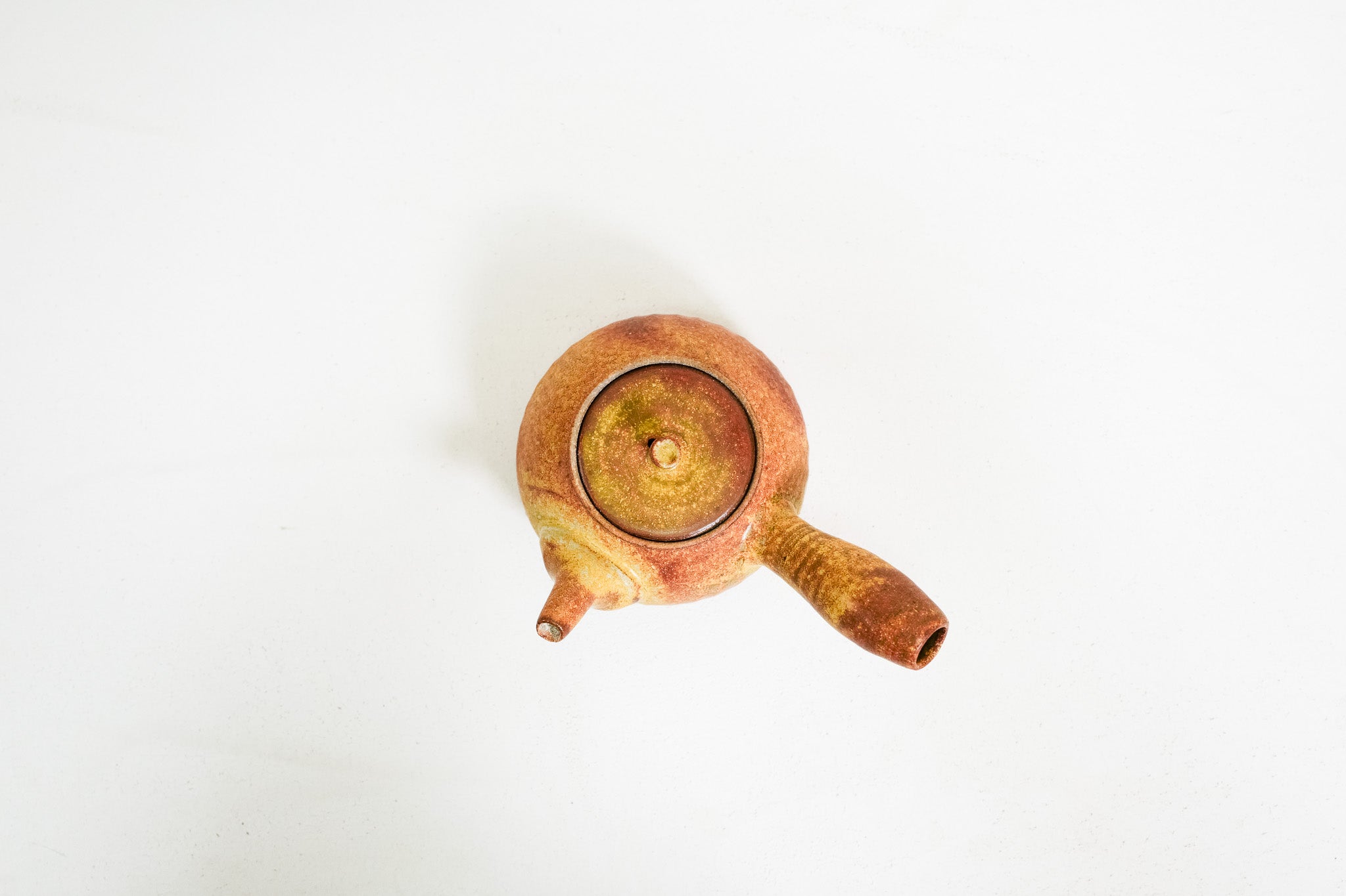 Ceramic side handle