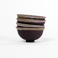 Set of 4 unique black and white bowls