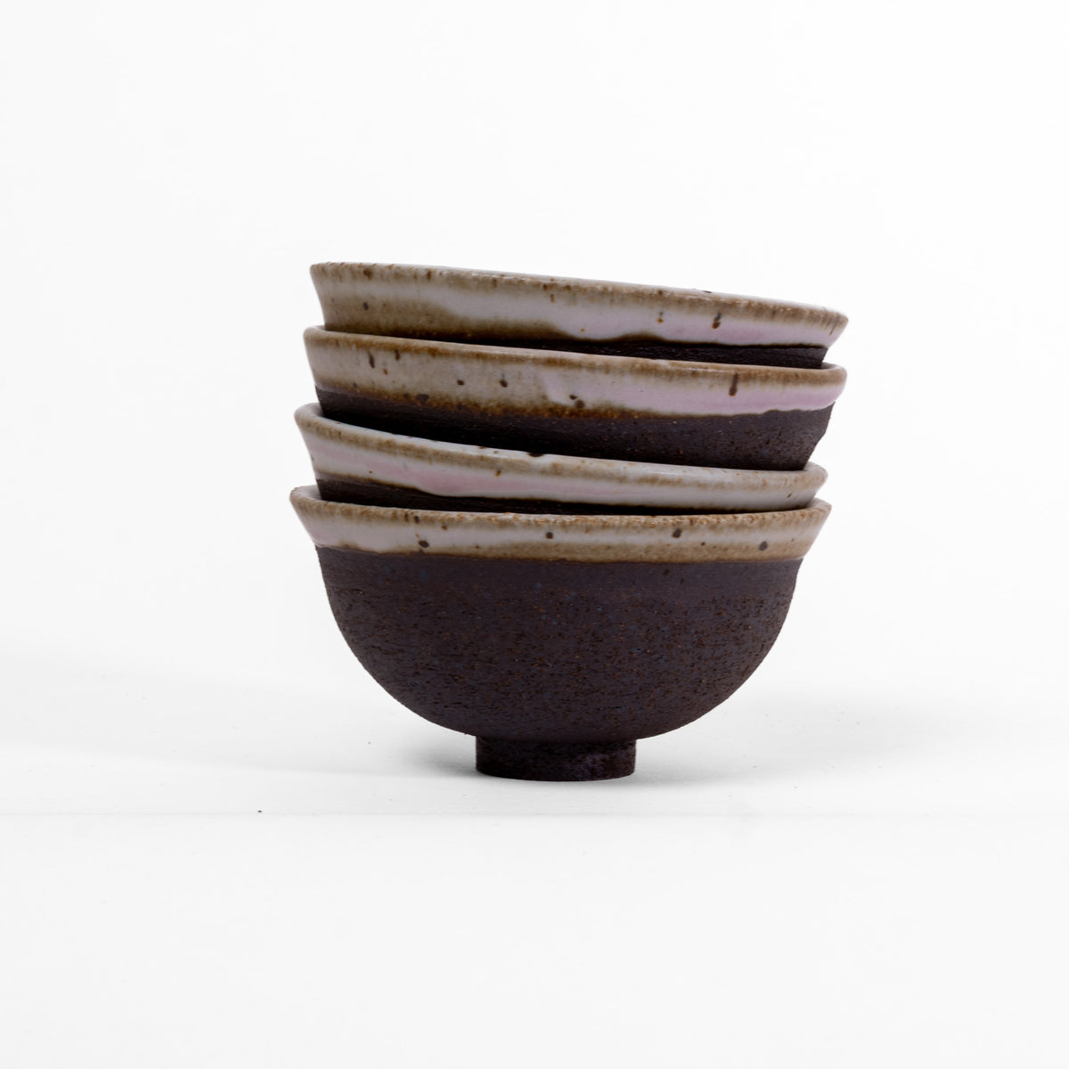 Set of 4 unique black and white bowls