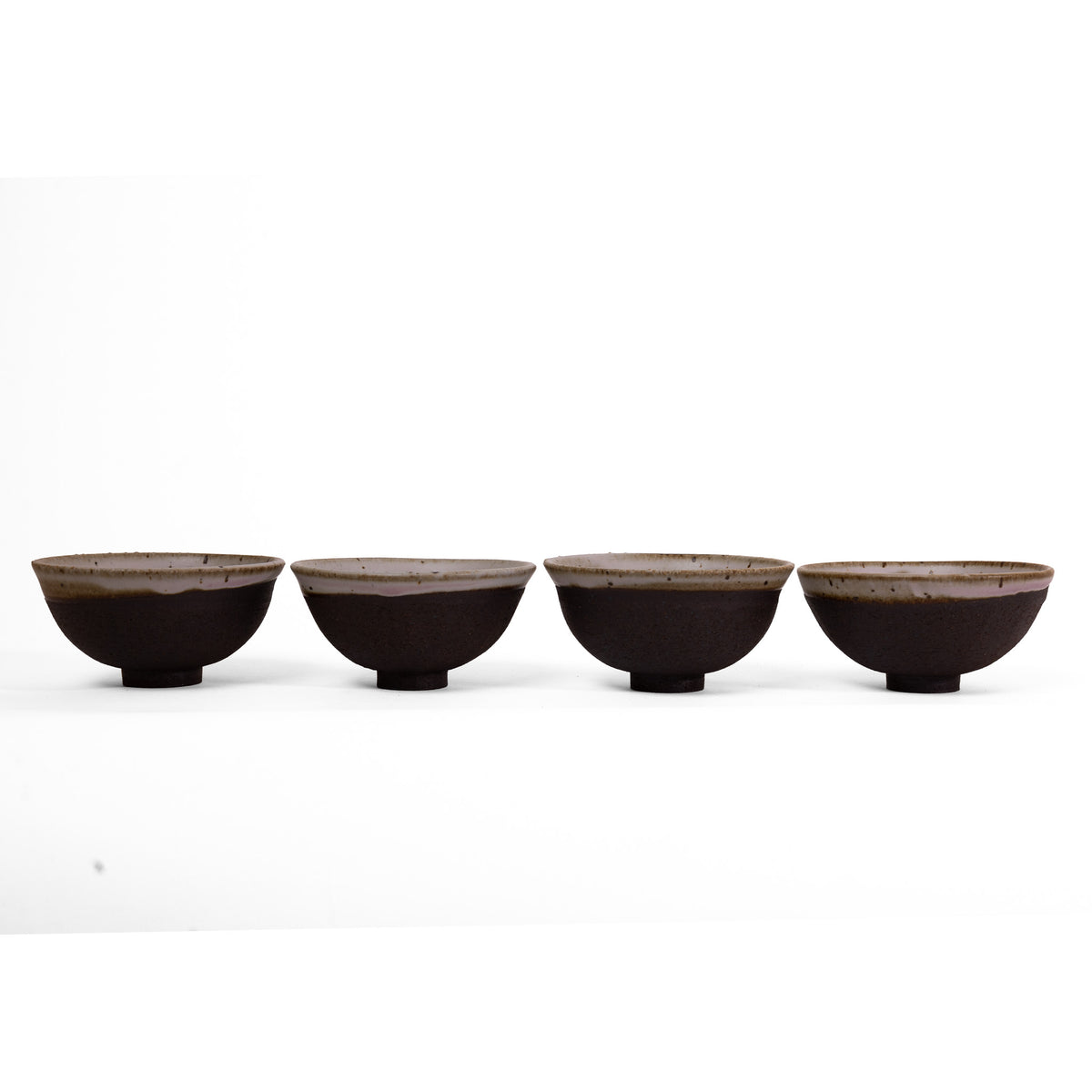 Set of 4 unique black and white bowls