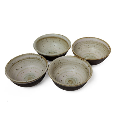 Set of 4 unique black and white bowls